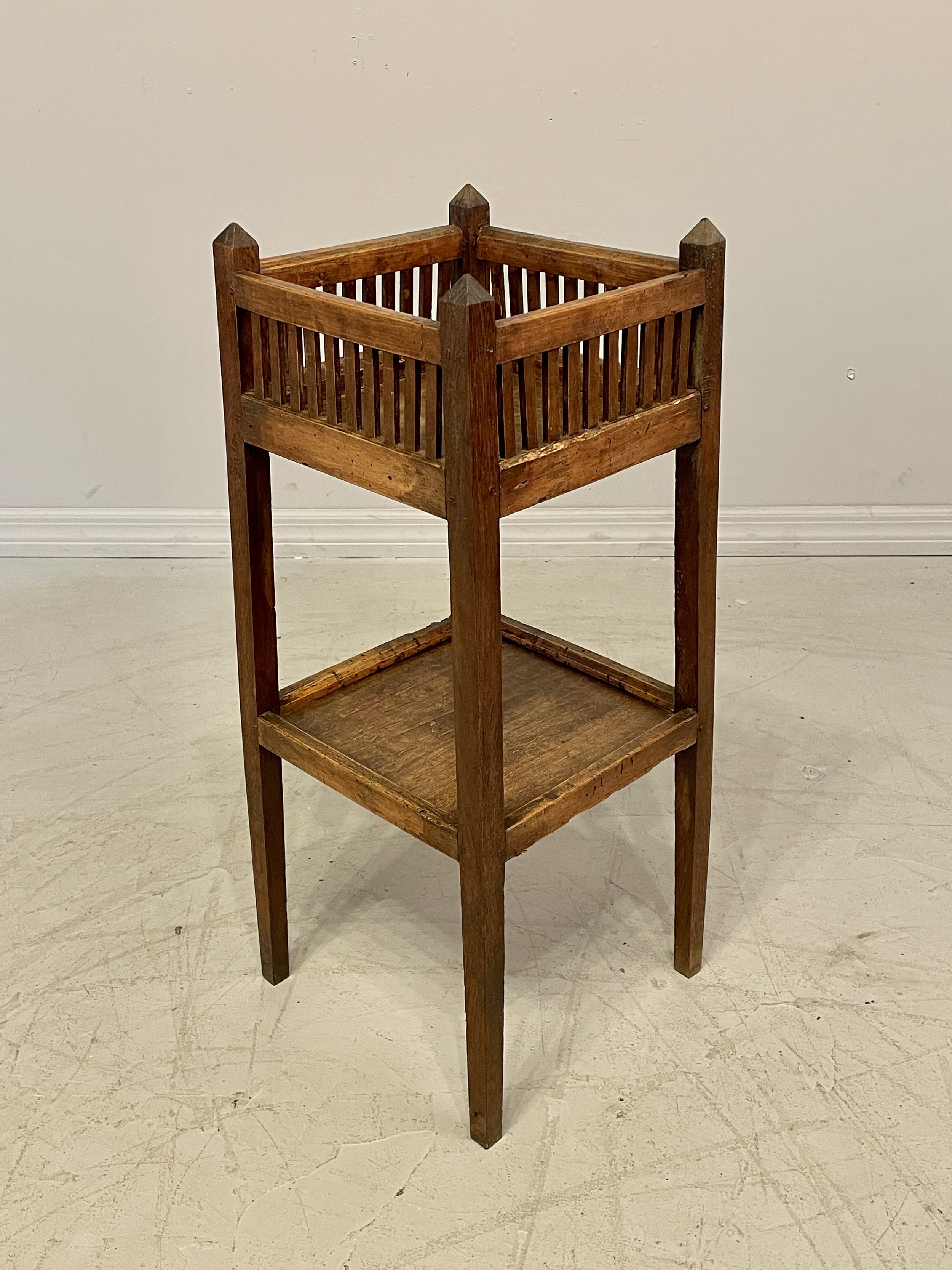 19th century French Provincial two tiers side table made of oak and beechwood. Pegged construction