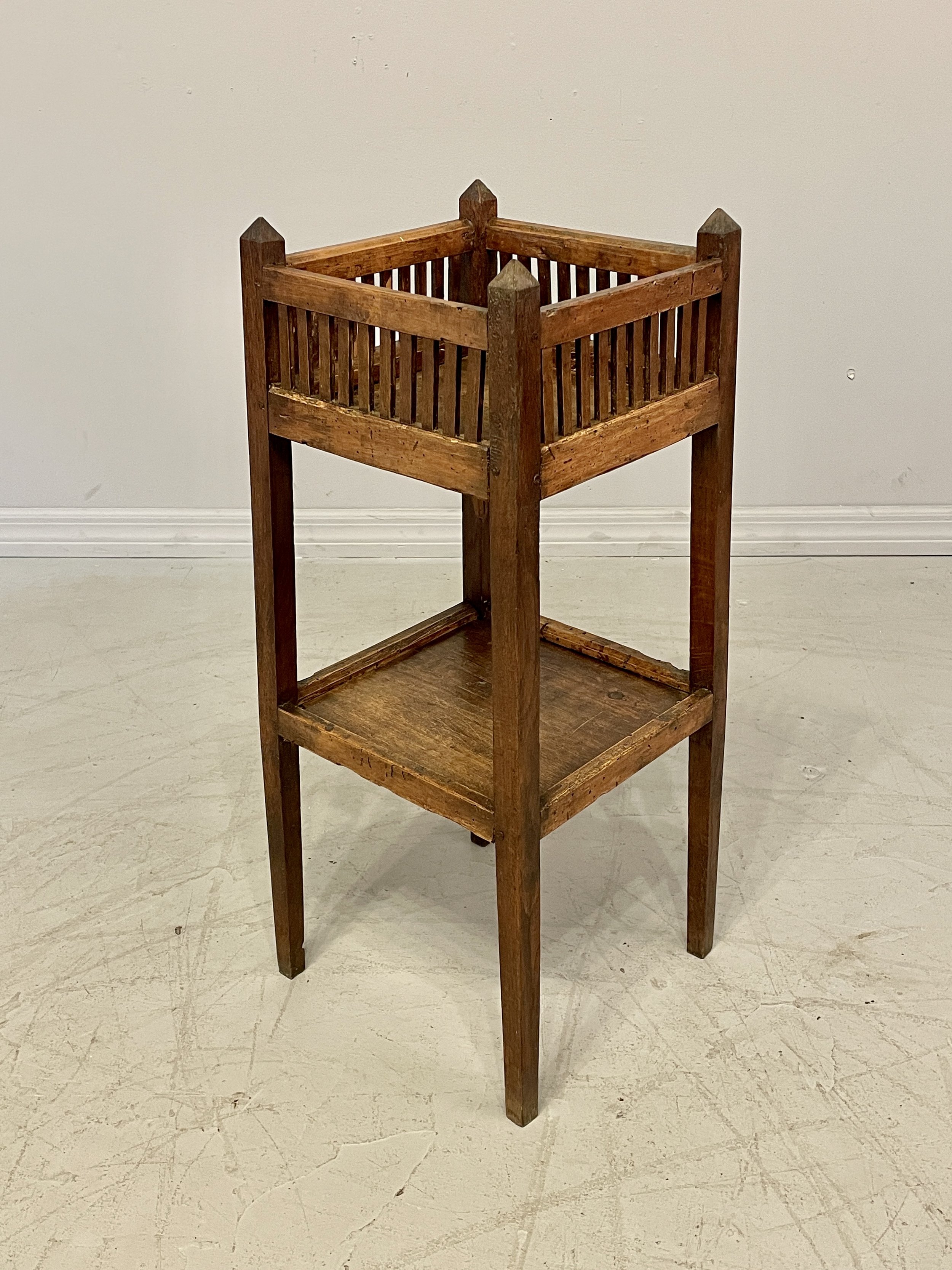 19th century French Provincial two tiers side table made of oak and beechwood. Pegged construction
