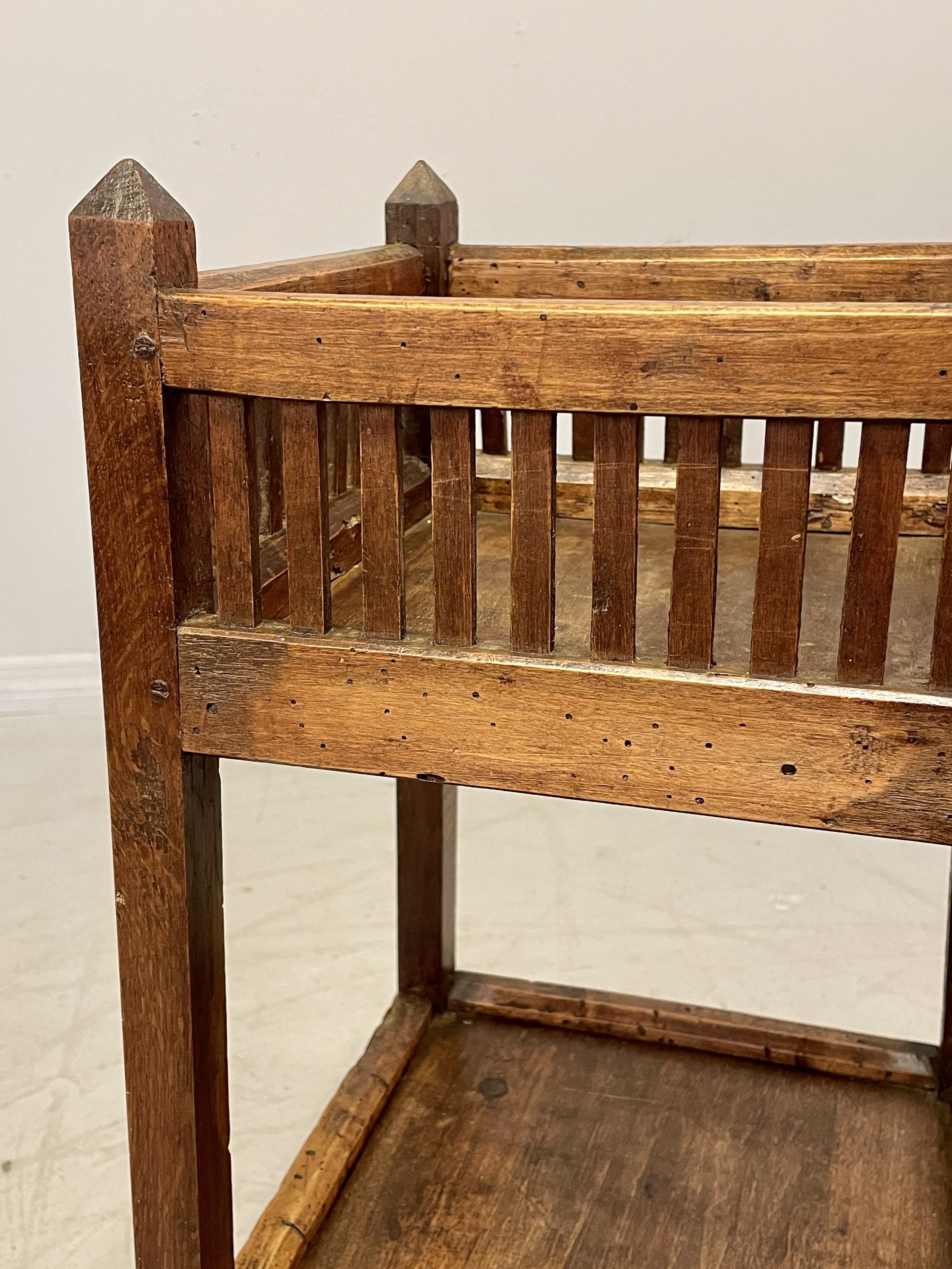 19th century French Provincial two tiers side table made of oak and beechwood. Pegged construction