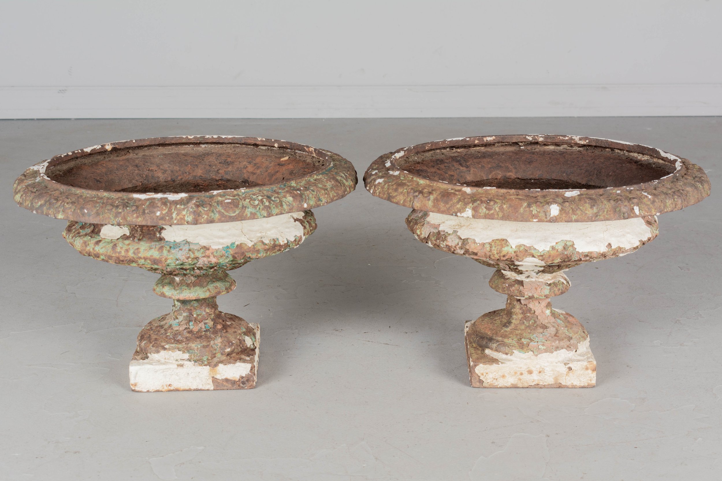 19th Century French Cast Iron Urns, a Pair