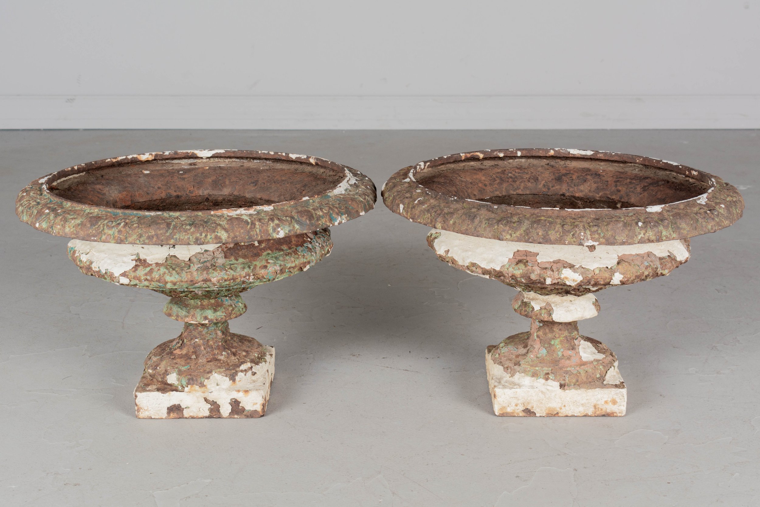 19th Century French Cast Iron Urns, a Pair