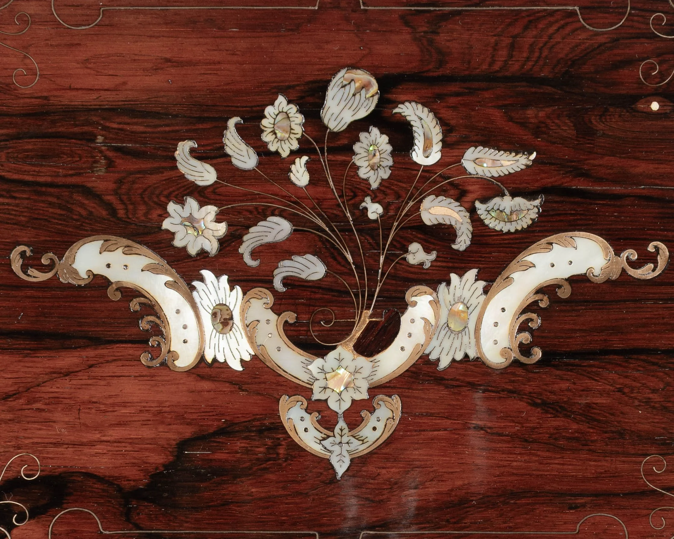 A 19th Century French Napoleon III marquetry box made of rosewood veneer with fine mother-of-pearl and brass inlay.