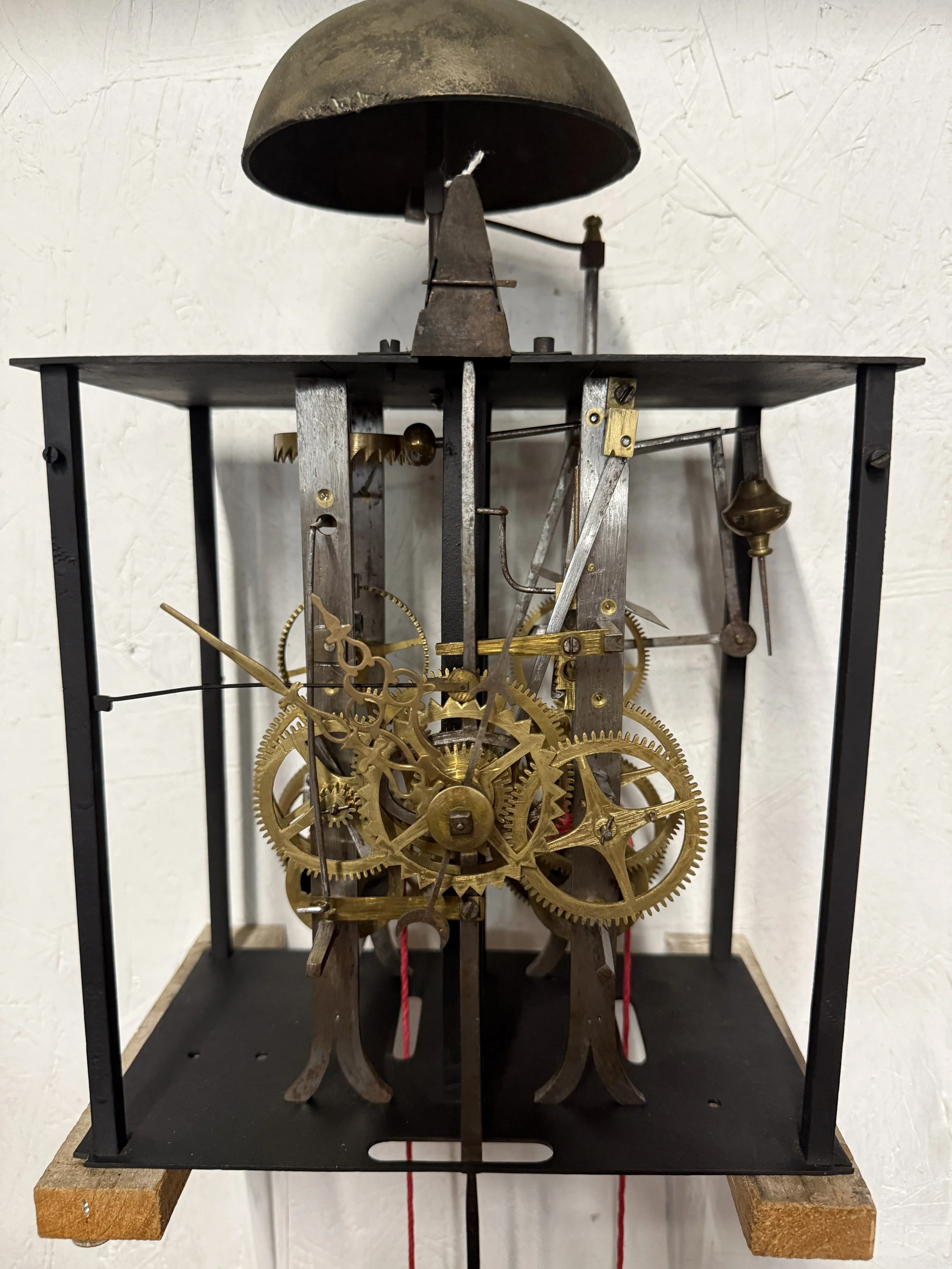 A late 19th century Morbier works for a tall case clock.