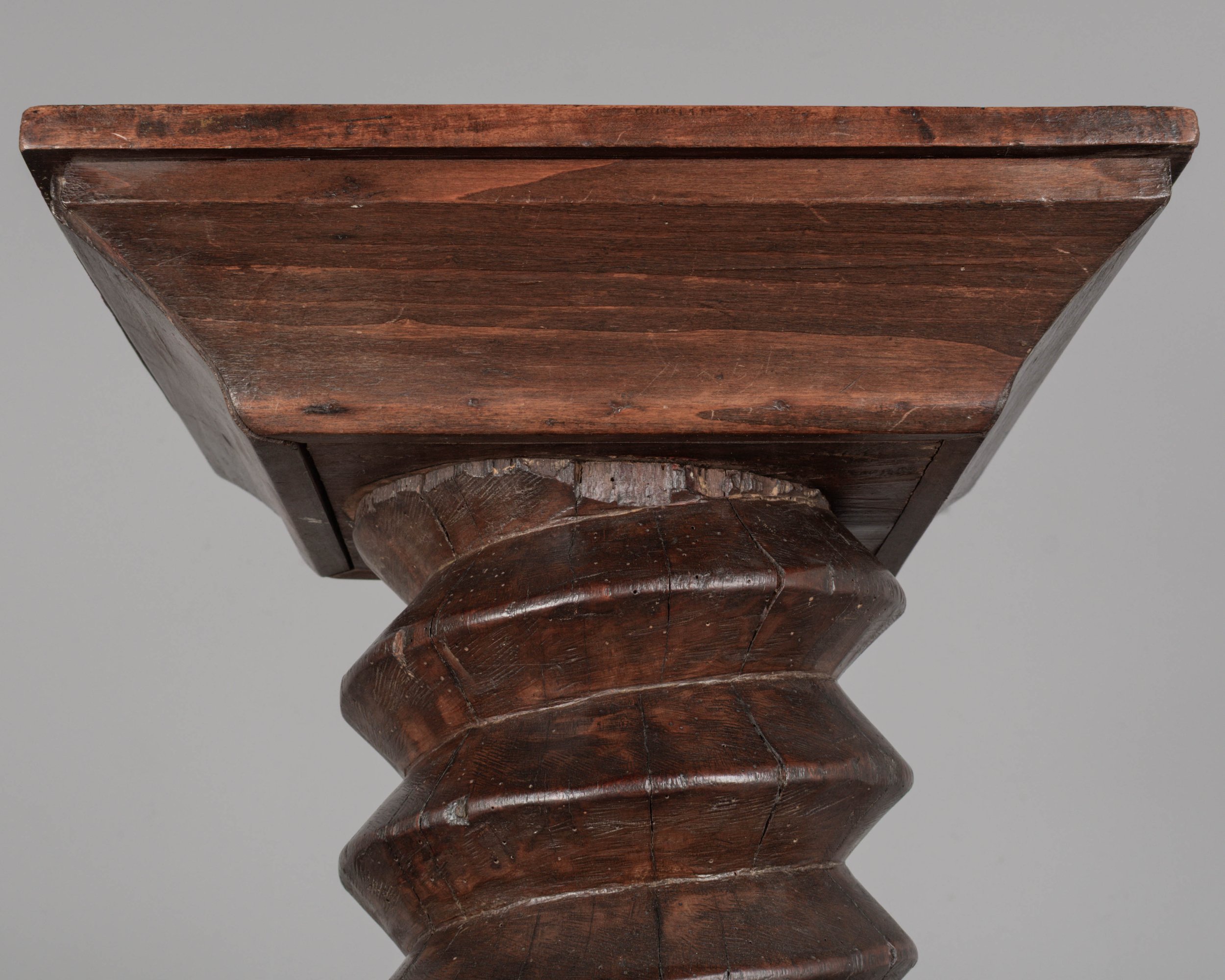 A late 18th century French wooden wine press screw, repurposed as a pedestal or plant stand