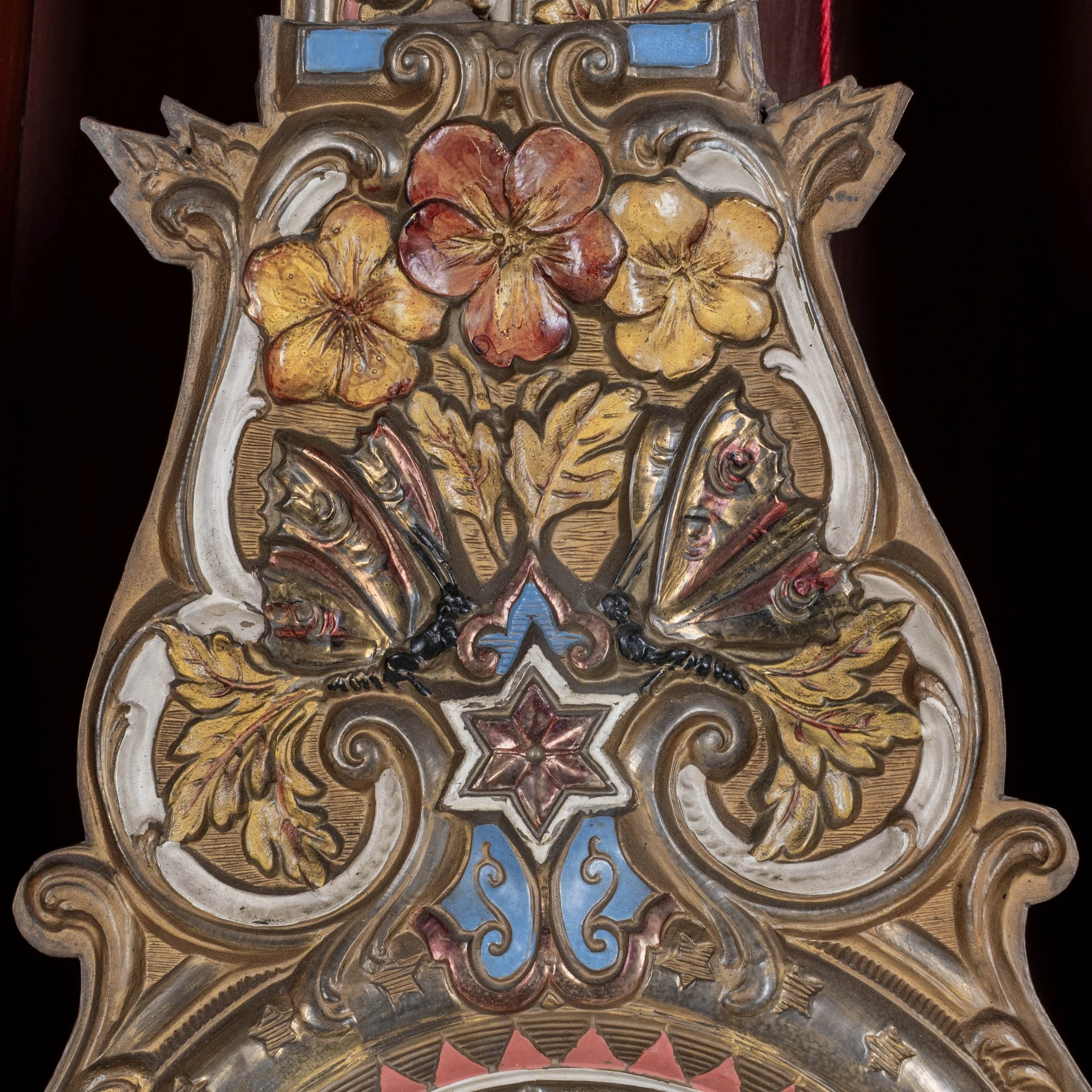 19th century Country French comtoise, or grandfather clock, with polychrome painted pine case and embossed brass pendulum.