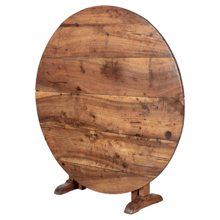19th century Country French wine tasting, or tilt-top table made of solid walnut.