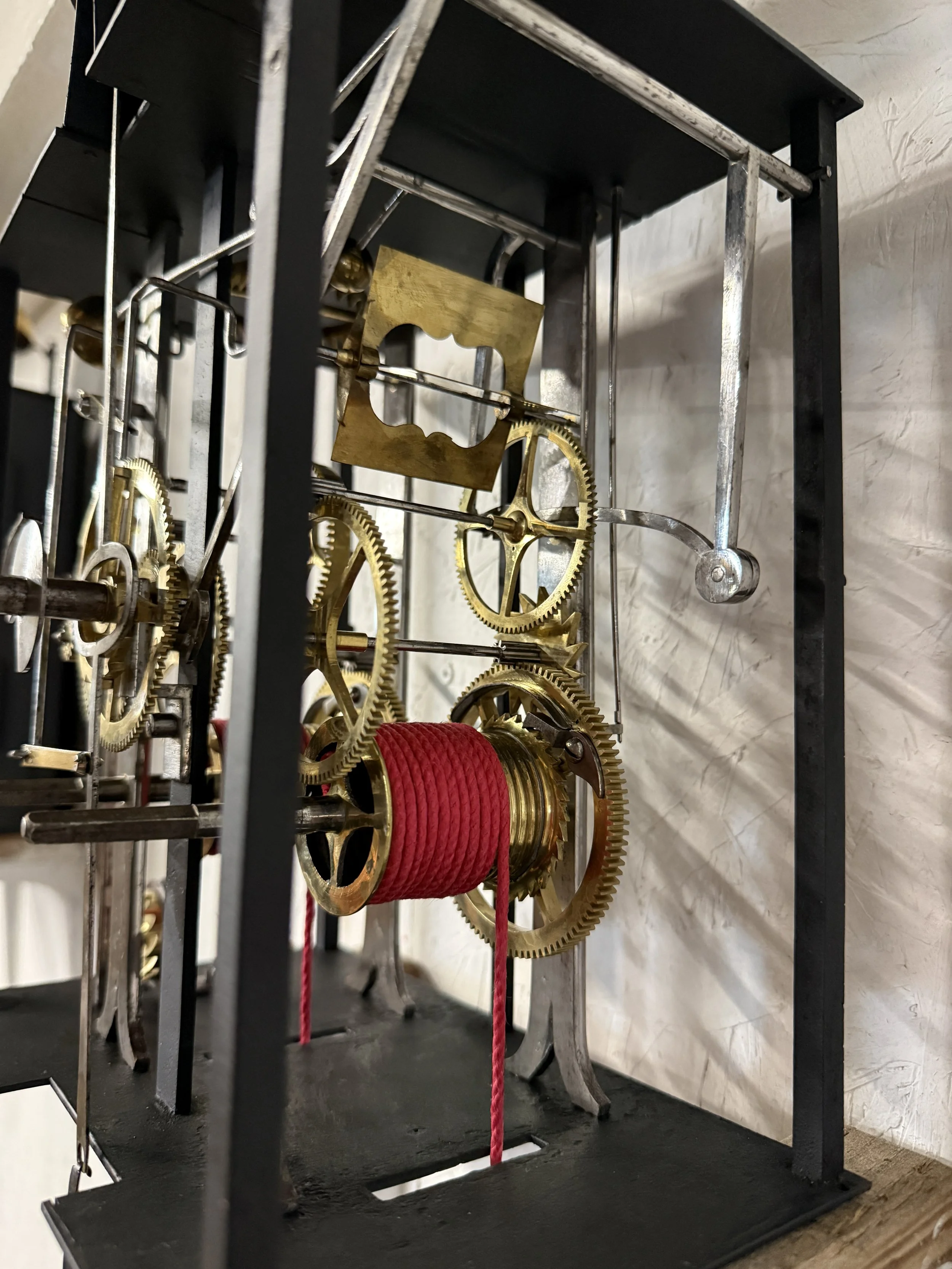 A late 19th century Morbier works for a tall case clock from Jobert Horloger at St Laurent Mâcon with brass embossment of Sun King