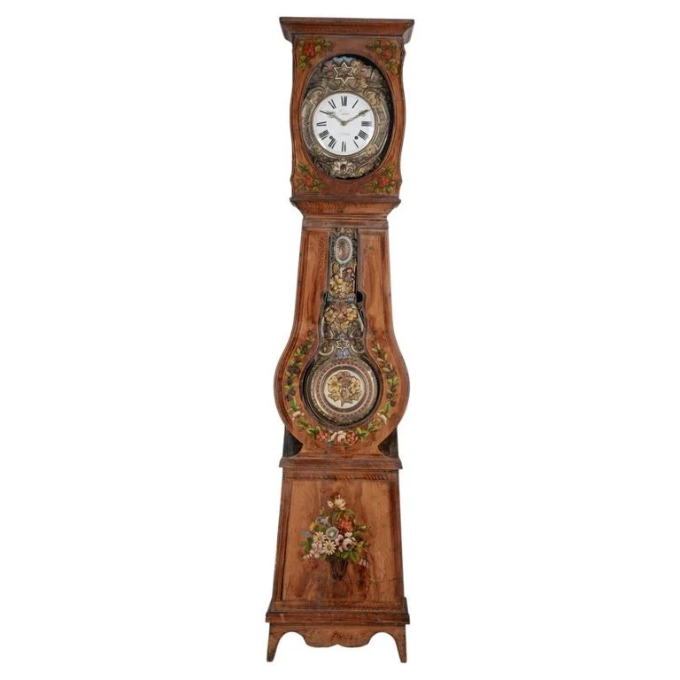 19th century Country French comtoise, or grandfather clock, with polychrome painted pine case and embossed brass pendulum.