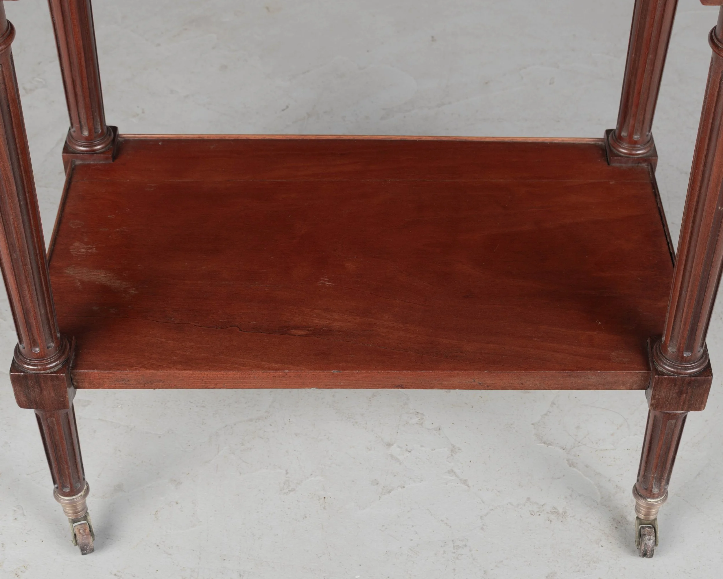 A 19th century French Louis XVI style marble top nightstand, or side table, made of veneers of mahogany with solid oak as a secondary wood