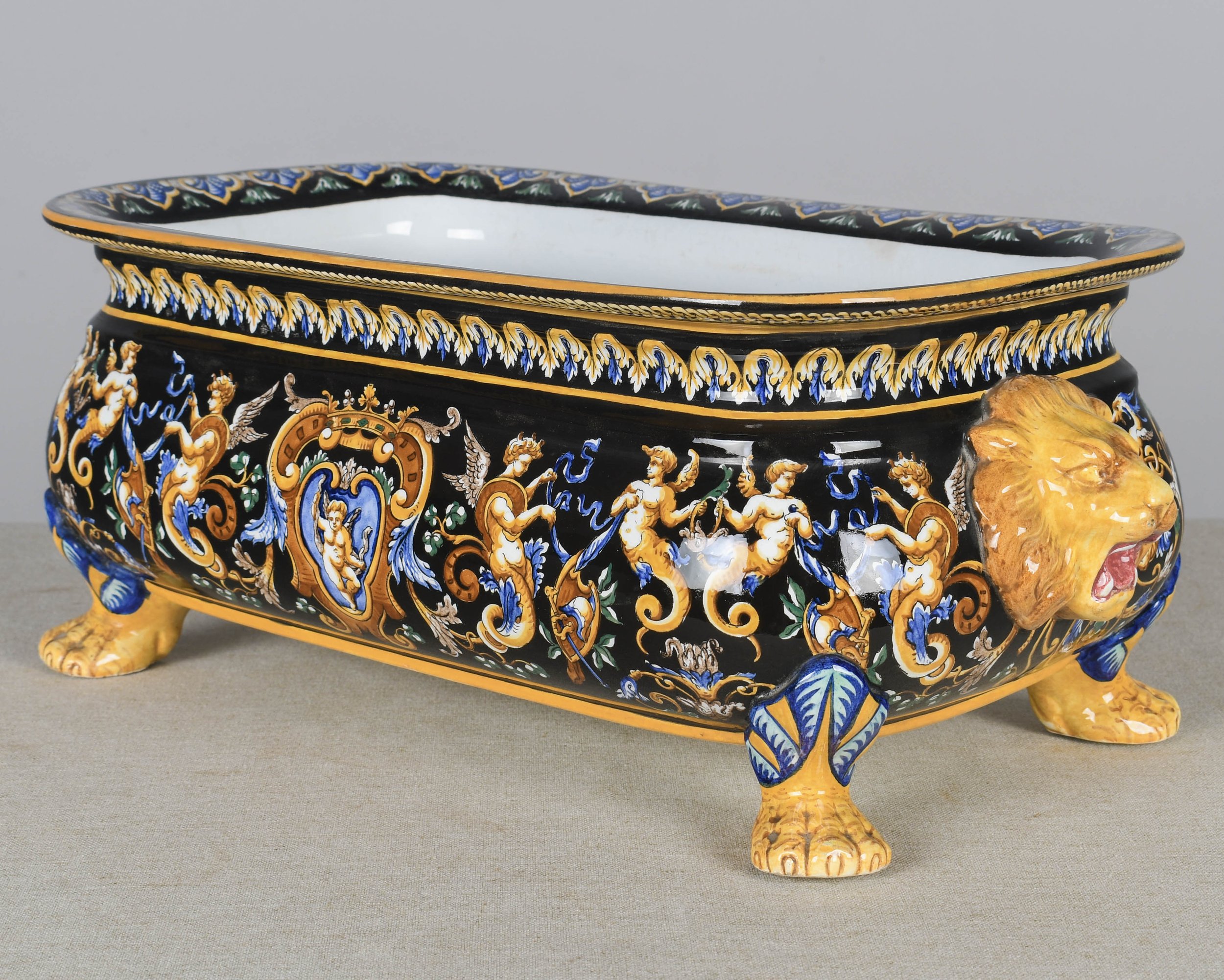 A late 19th century French Gien faience ceramic jardinière, or shallow footed centerpiece bowl.