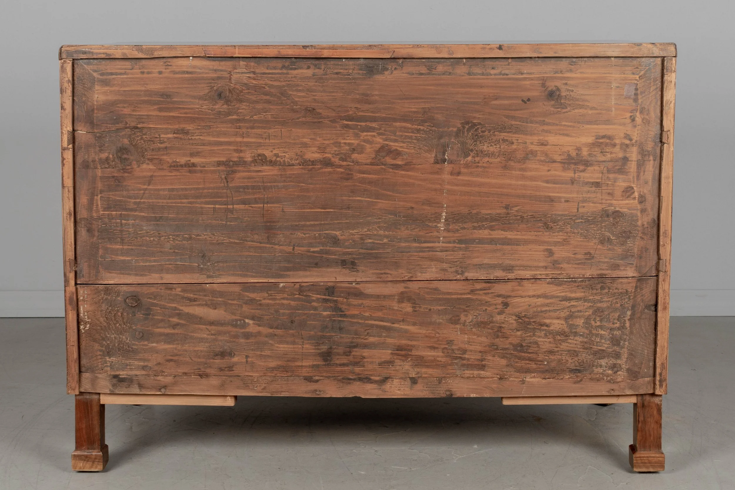 A fine 19th century Biedermeier commode from Austria made with beautifully patterned book matched veneer of walnut over pine.