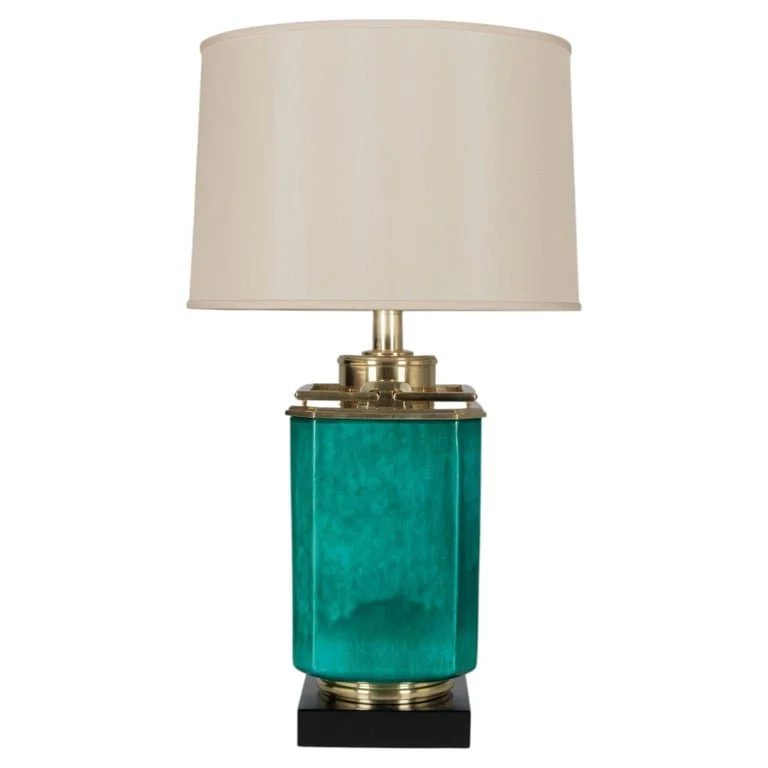 A Mid Century table lamp by Edwin Cole for Stiffel. Large octagonal deeply saturated heavy glazed ceramic body in beautiful shade of turquoise,