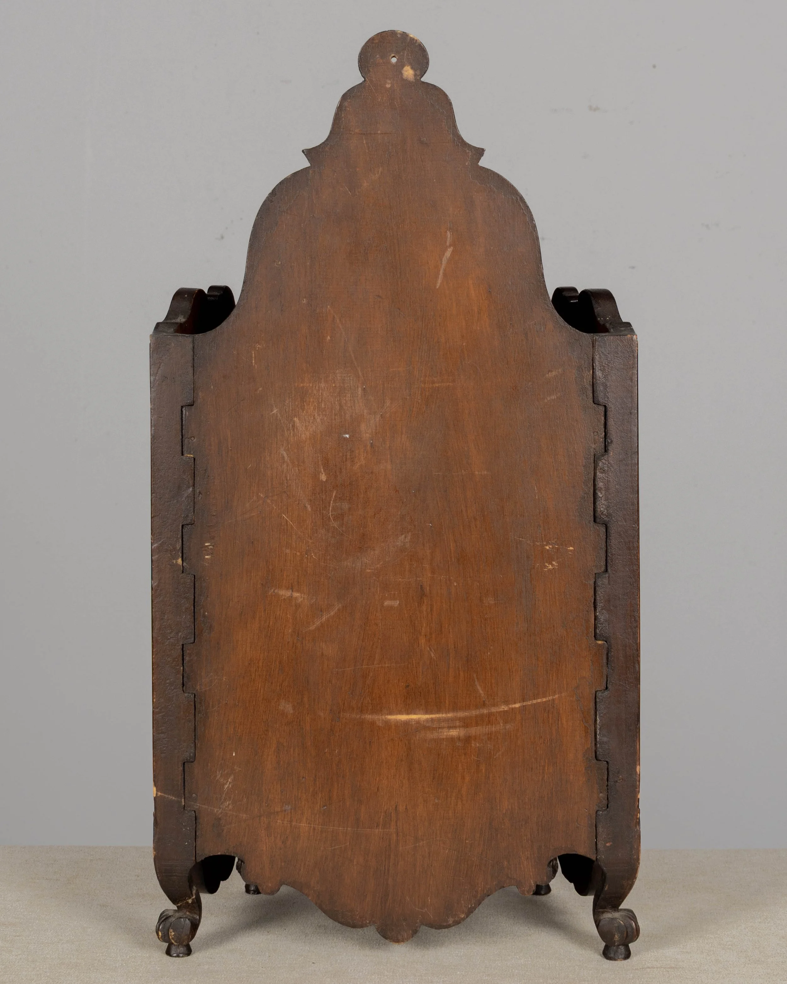 19th century French fariniere made of walnut with nicely detailed hand-carved decorative motifs: