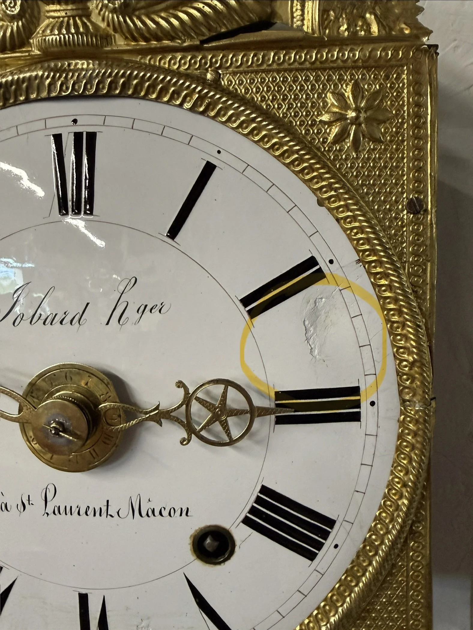 A late 19th century Morbier works for a tall case clock from Jobert Horloger at St Laurent Mâcon with brass embossment of Sun King