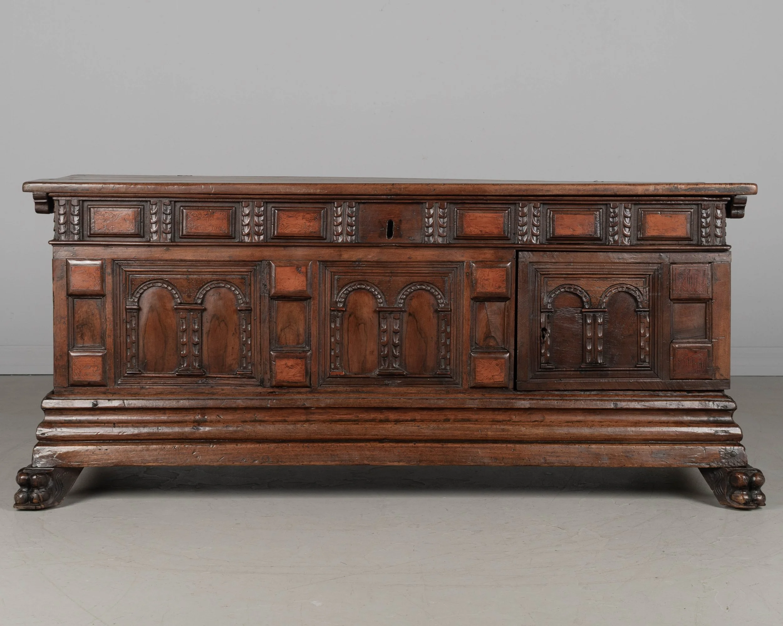 A suberb 18th century Italian Rennaissance style Baroque cassone, or marriage chest, made of solid walnut.