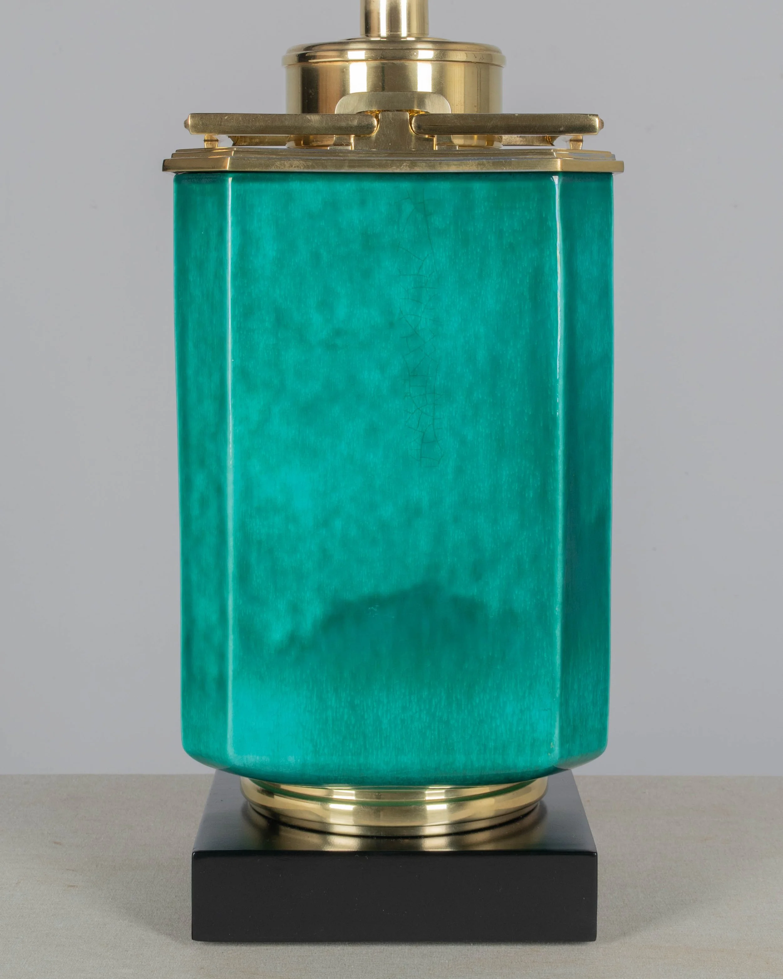 A Mid Century table lamp by Edwin Cole for Stiffel. Large octagonal deeply saturated heavy glazed ceramic body in beautiful shade of turquoise,
