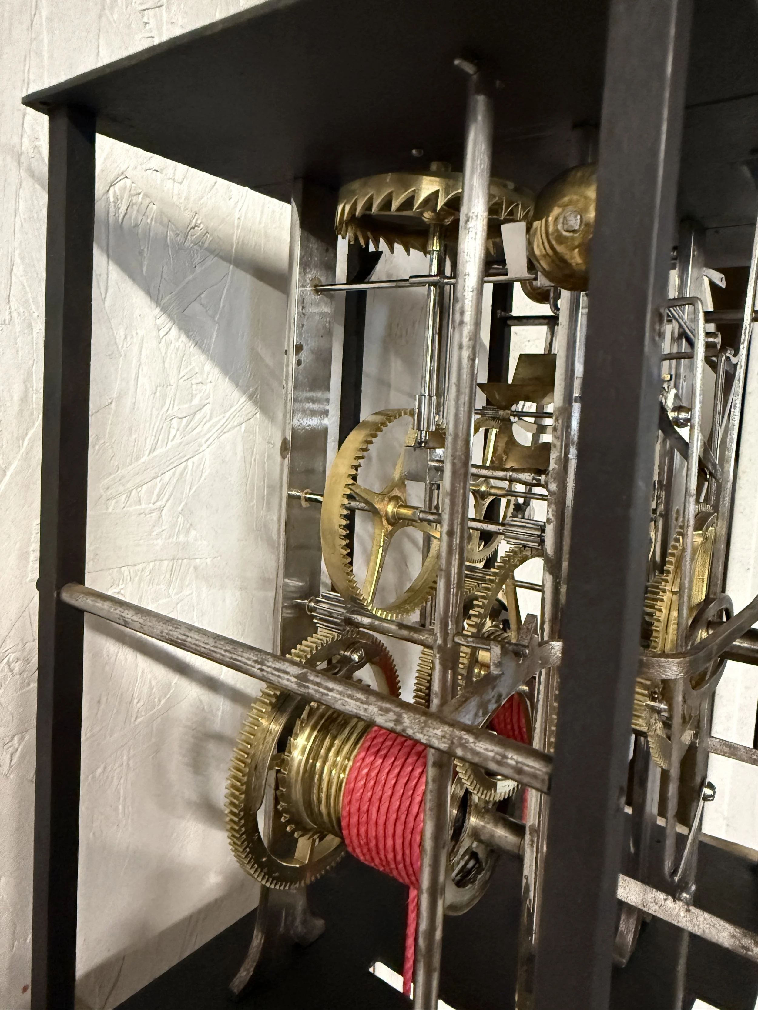 A late 19th century Morbier works for a tall case clock from Jobert Horloger at St Laurent Mâcon with brass embossment of Sun King
