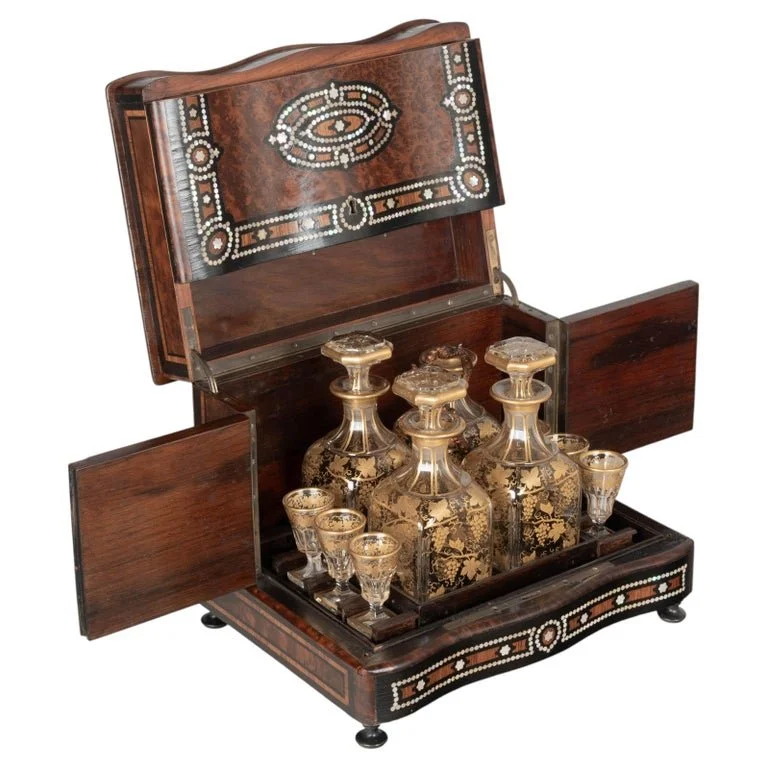A fine 19th century French Napoleon III tantalus, or cave à liqueur, in the style of Charles-Guillaume Diehl