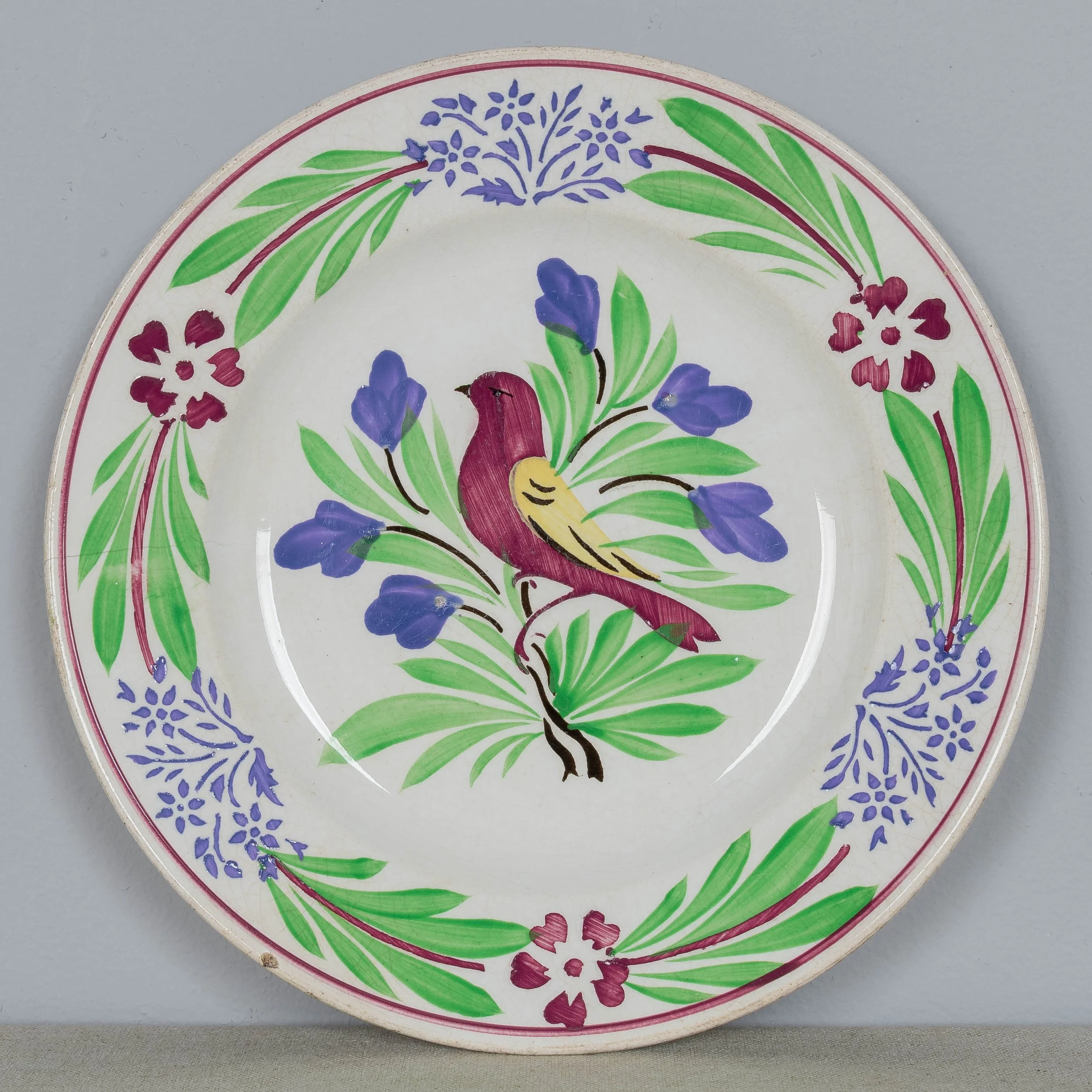 A set of three 19th Century French glazed faience plates made by Sarreguemines