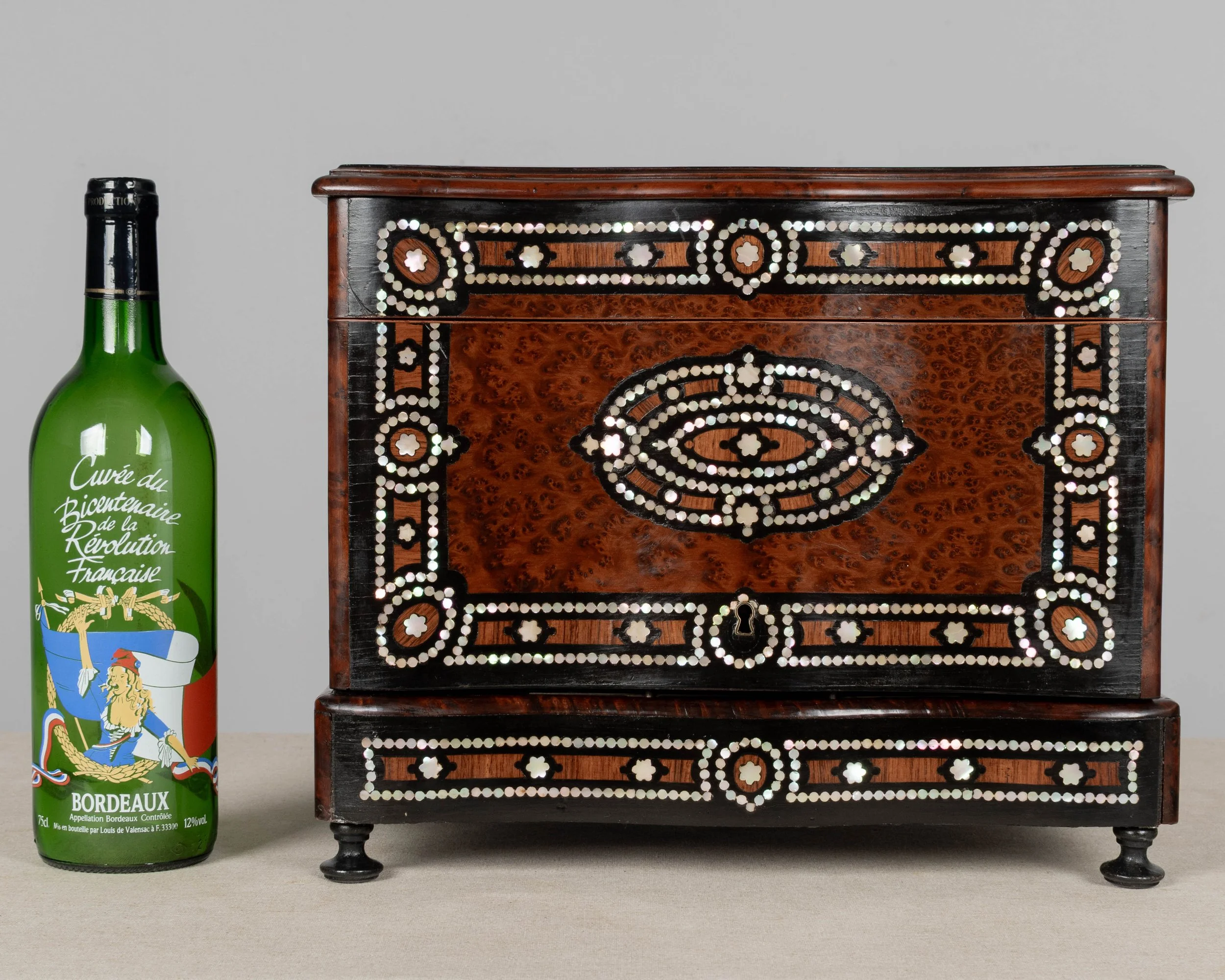 A fine 19th century French Napoleon III tantalus, or cave à liqueur, in the style of Charles-Guillaume Diehl