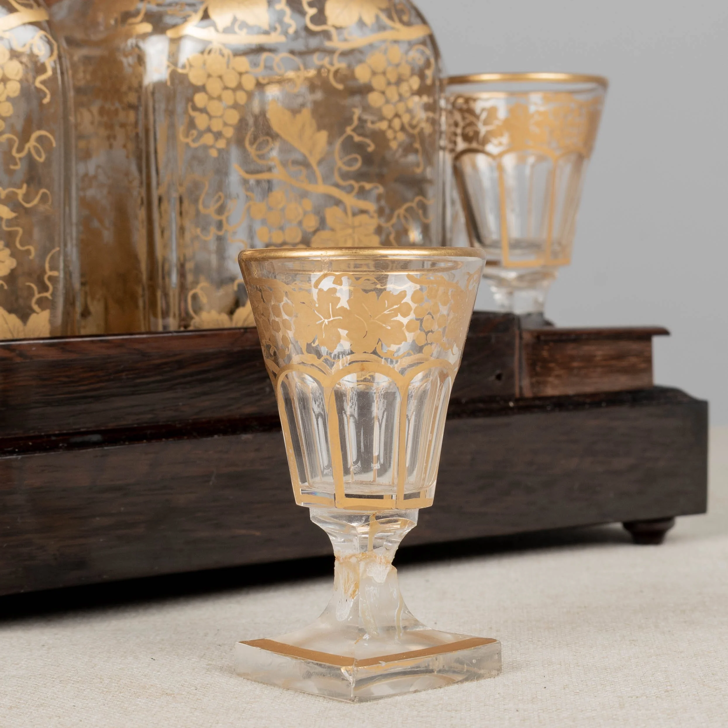 A fine 19th century French Napoleon III tantalus, or cave à liqueur, in the style of Charles-Guillaume Diehl