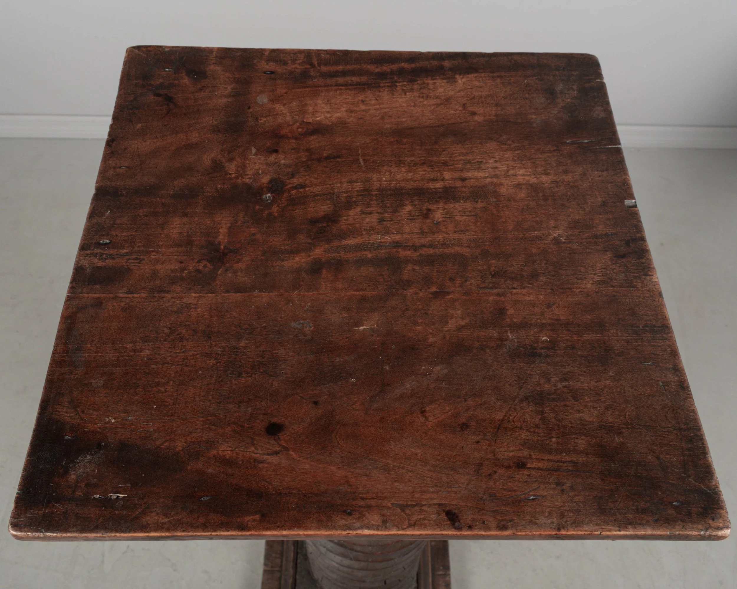 A late 18th century French wooden wine press screw, repurposed as a pedestal or plant stand