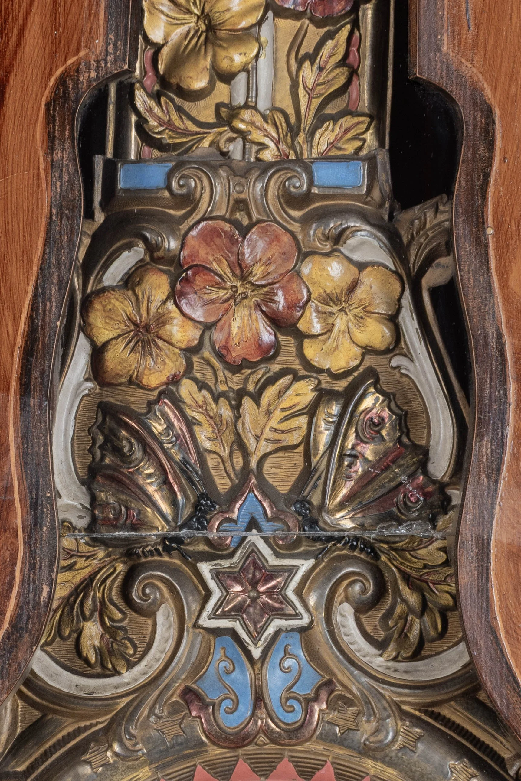 19th century Country French comtoise, or grandfather clock, with polychrome painted pine case and embossed brass pendulum.