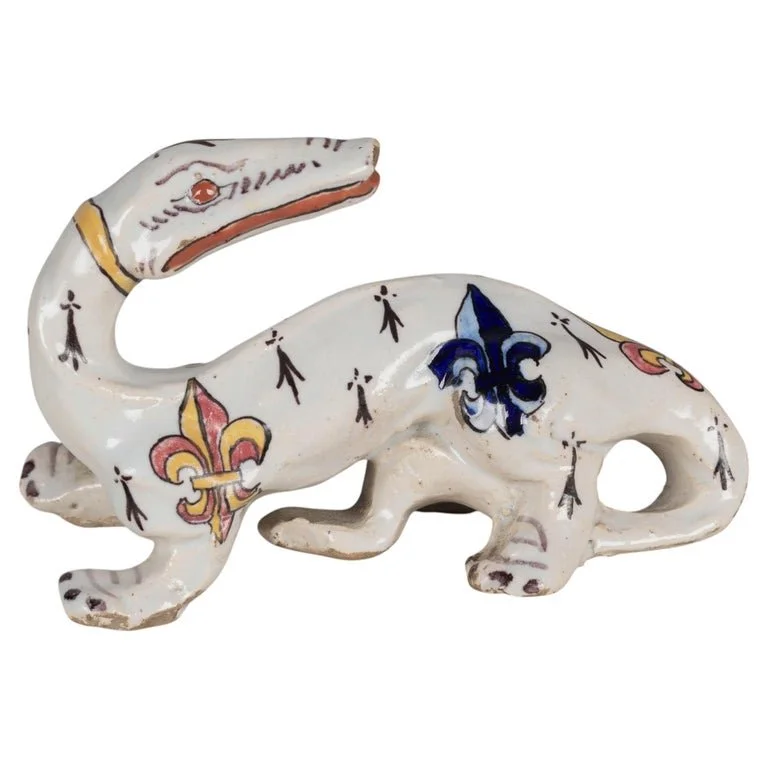 A 19th Century French Desvres faience whimsical salamander figurine by Fourmaintraux Freres.