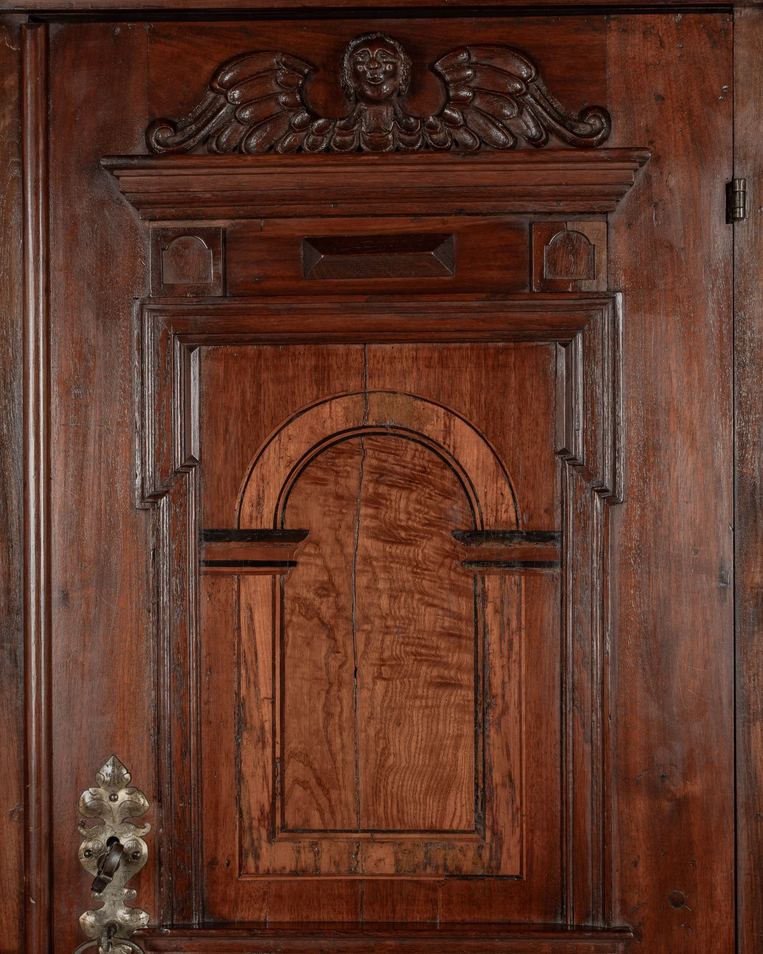 19th Century French Perigord Armoire made of solid walnut and veneers of walnut with pine as a secondary wood.