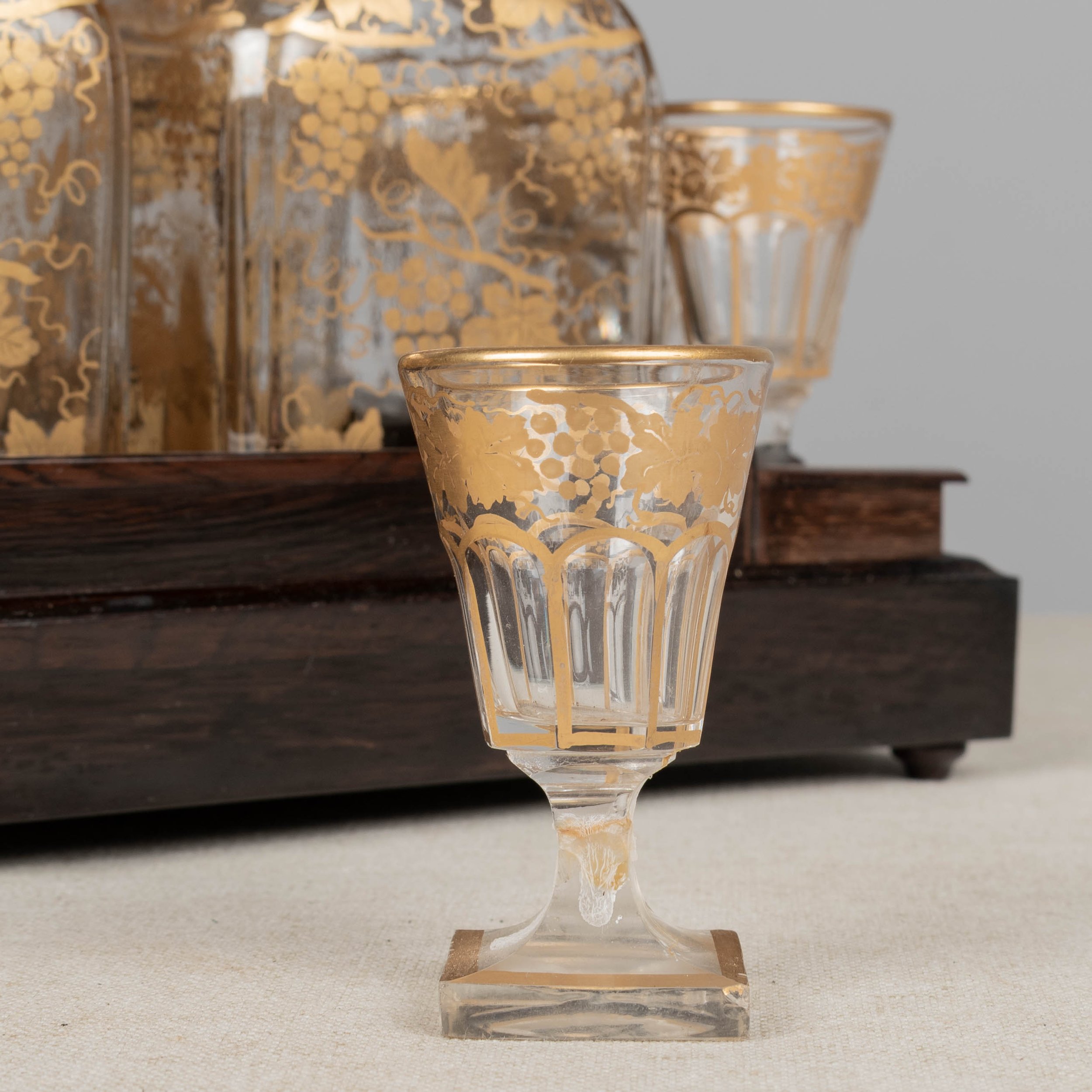 A fine 19th century French Napoleon III tantalus, or cave à liqueur, in the style of Charles-Guillaume Diehl