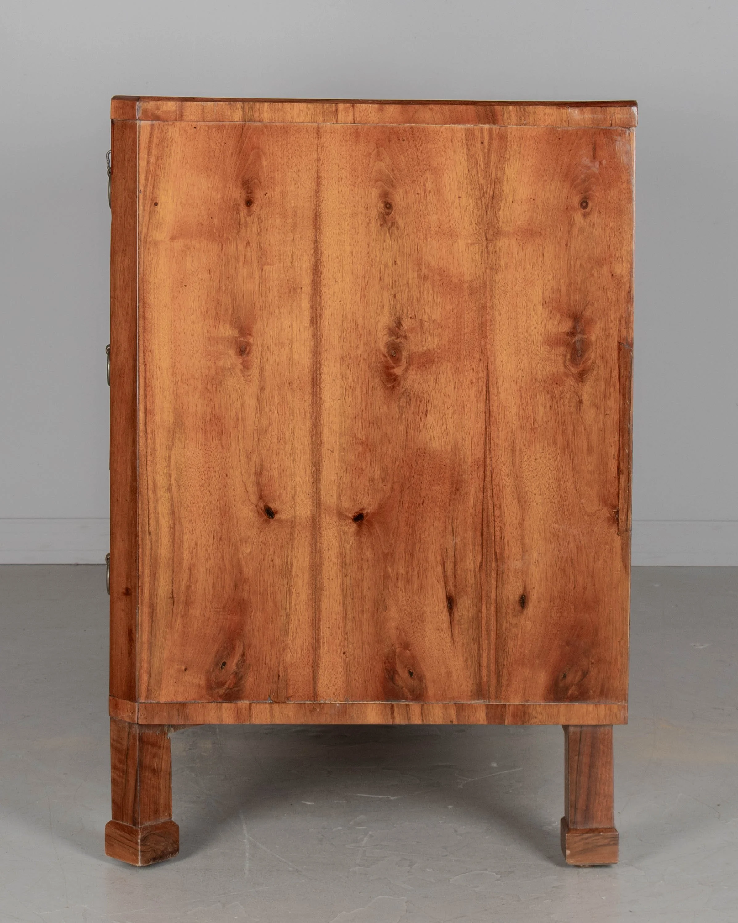 A fine 19th century Biedermeier commode from Austria made with beautifully patterned book matched veneer of walnut over pine.