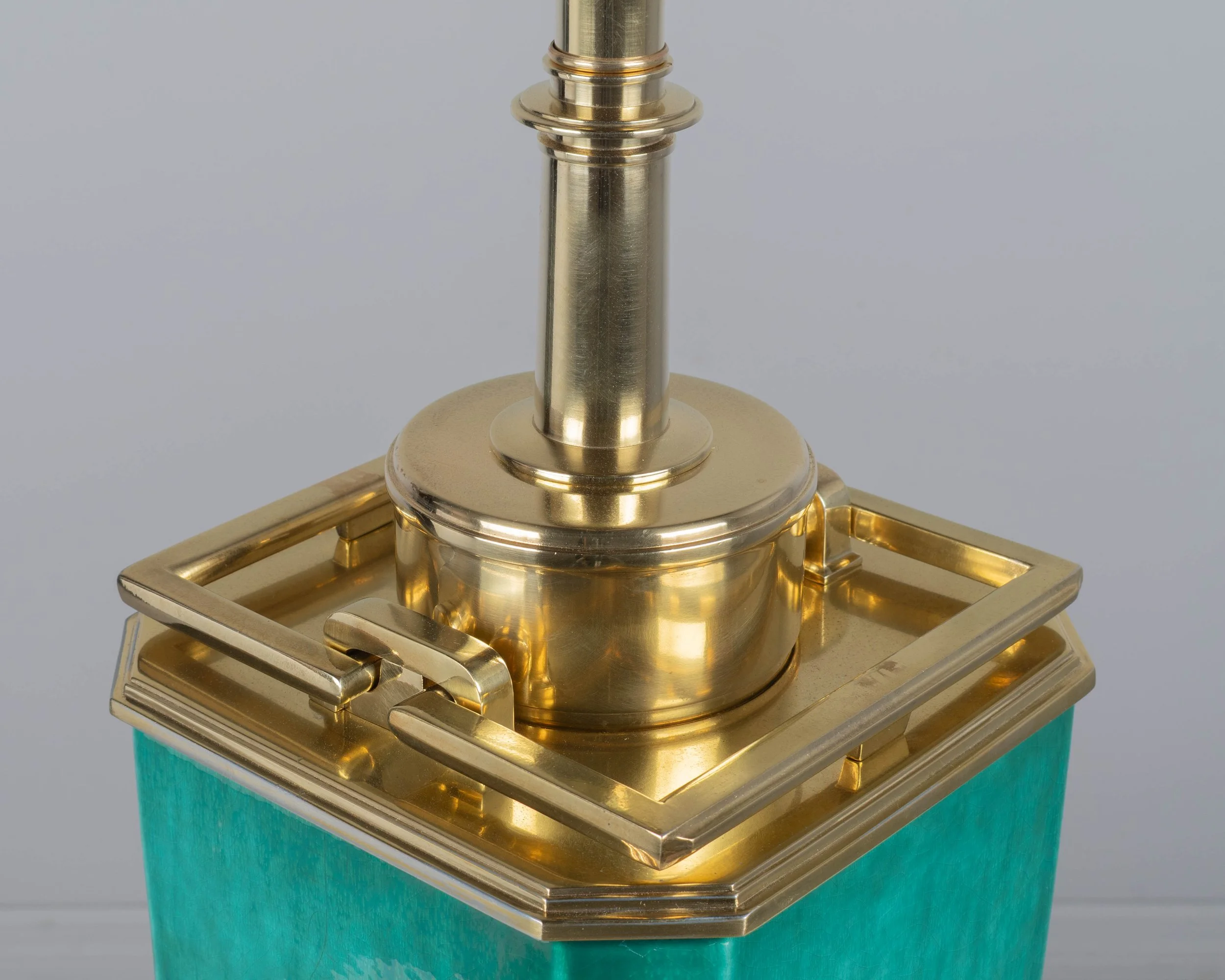 A Mid Century table lamp by Edwin Cole for Stiffel. Large octagonal deeply saturated heavy glazed ceramic body in beautiful shade of turquoise,