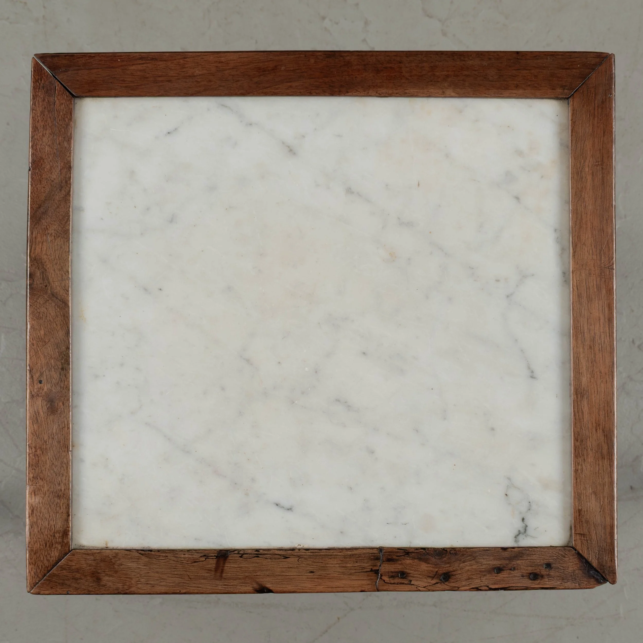 A 19th century French Country walnut side table, or nightstand, with a vertical tambour door above a cabinet door