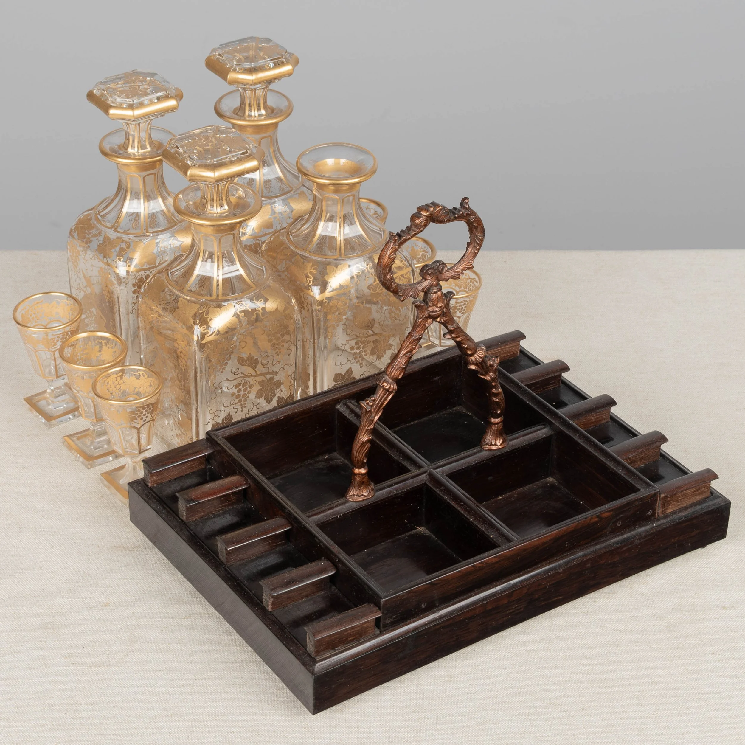 A fine 19th century French Napoleon III tantalus, or cave à liqueur, in the style of Charles-Guillaume Diehl