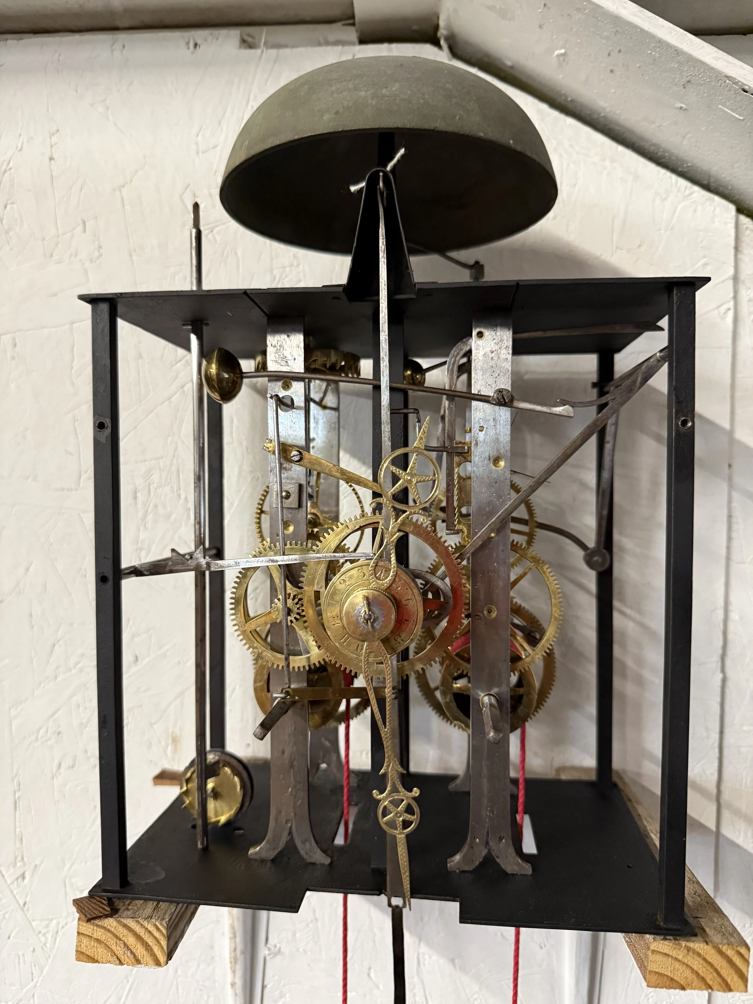 A late 19th century Morbier works for a tall case clock from Jobert Horloger at St Laurent Mâcon with brass embossment of Sun King
