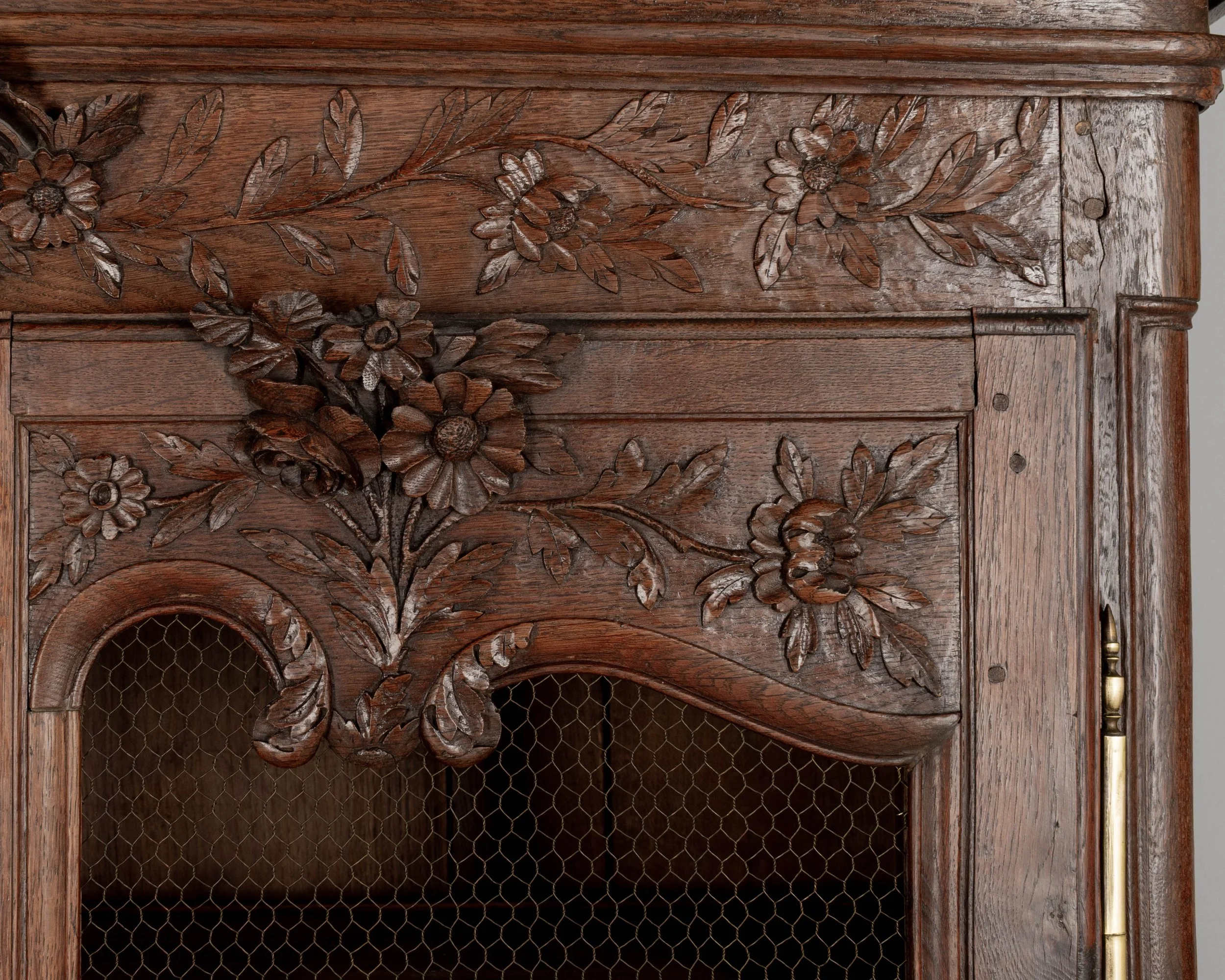 A 19th century Louis XV style Country French armoire, or display cabinet from Normandy.