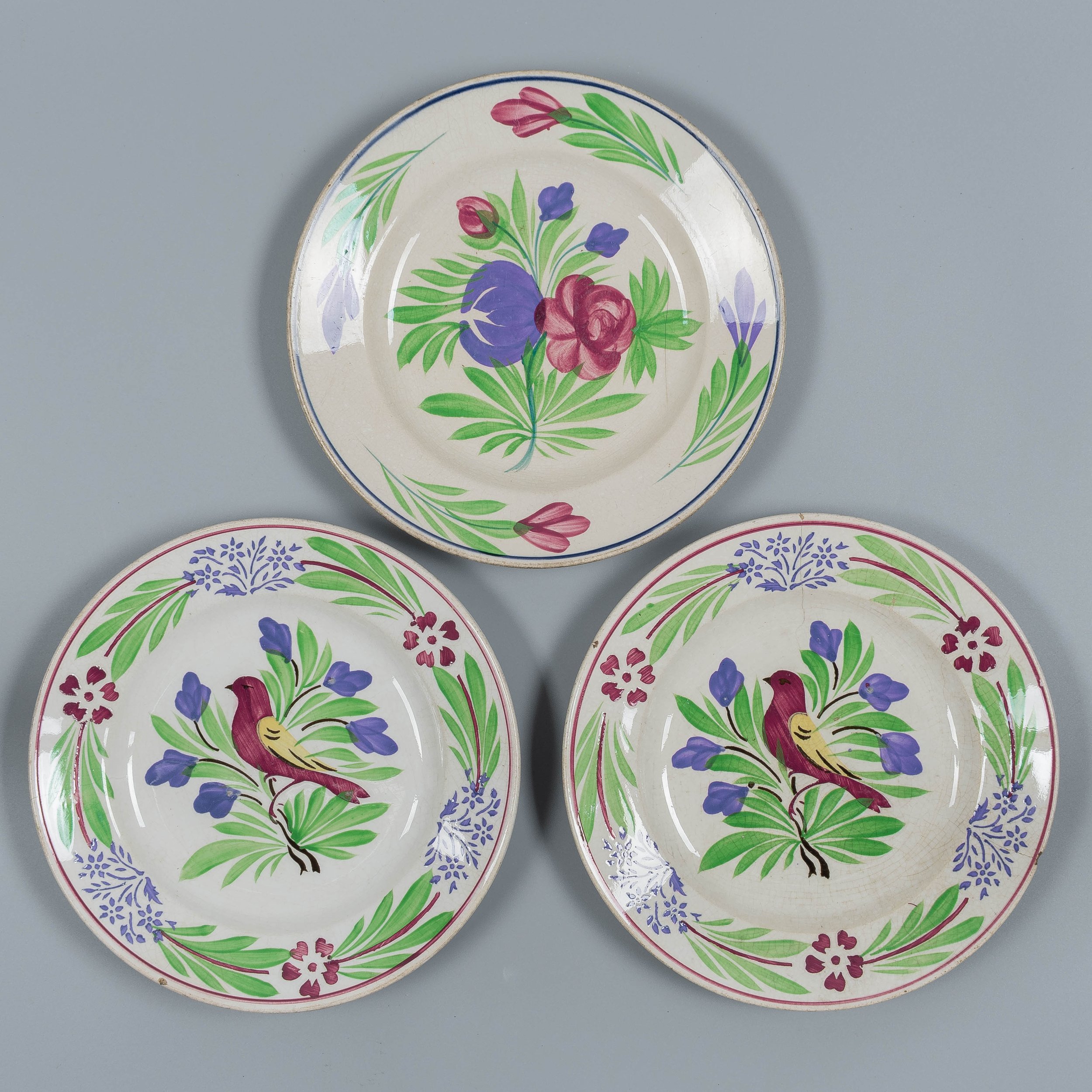 A set of three 19th Century French glazed faience plates made by Sarreguemines