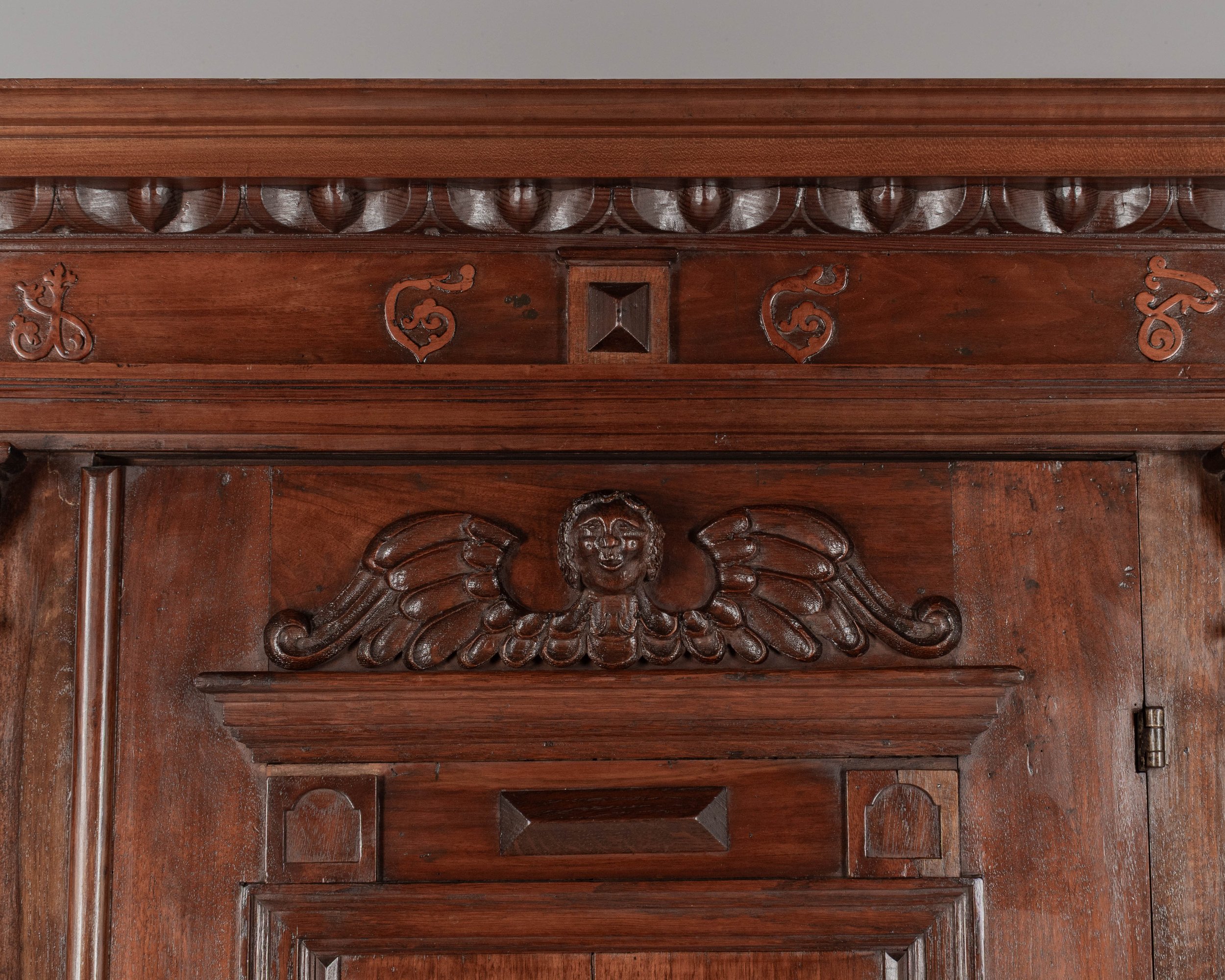 19th Century French Perigord Armoire made of solid walnut and veneers of walnut with pine as a secondary wood.