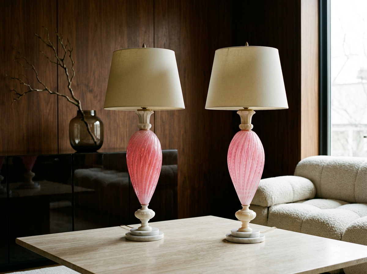 A pair of Mid Century Murano glass lamps by Alfredo Barbini. Beautiful opalescent cotton candy pink color. Hand-blown swirled ribbed glass with controlled bubbles.
