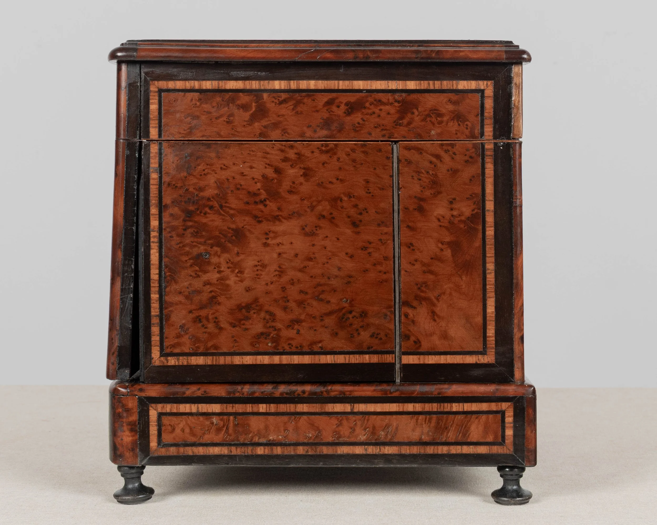 A fine 19th century French Napoleon III tantalus, or cave à liqueur, in the style of Charles-Guillaume Diehl