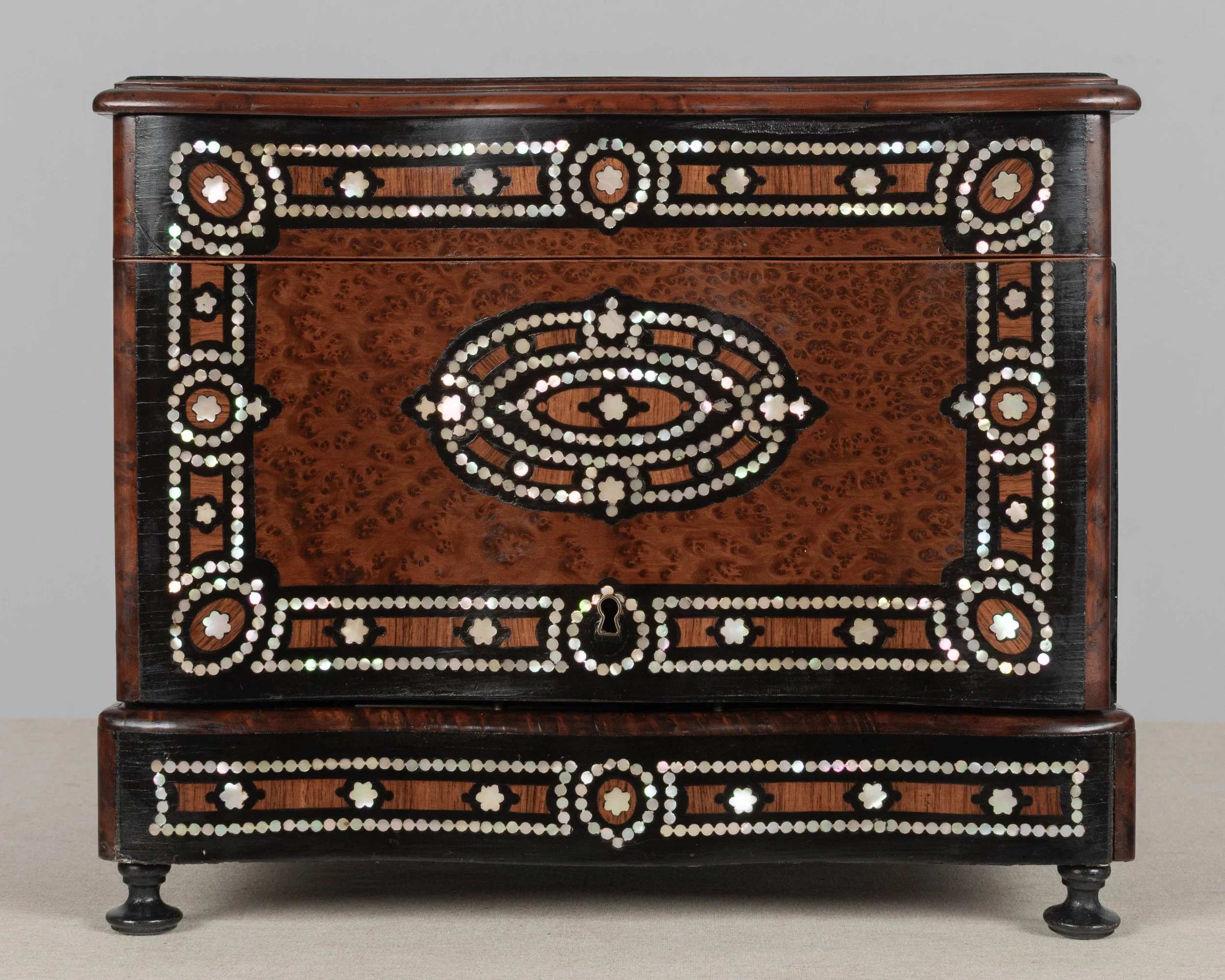 A fine 19th century French Napoleon III tantalus, or cave à liqueur, in the style of Charles-Guillaume Diehl