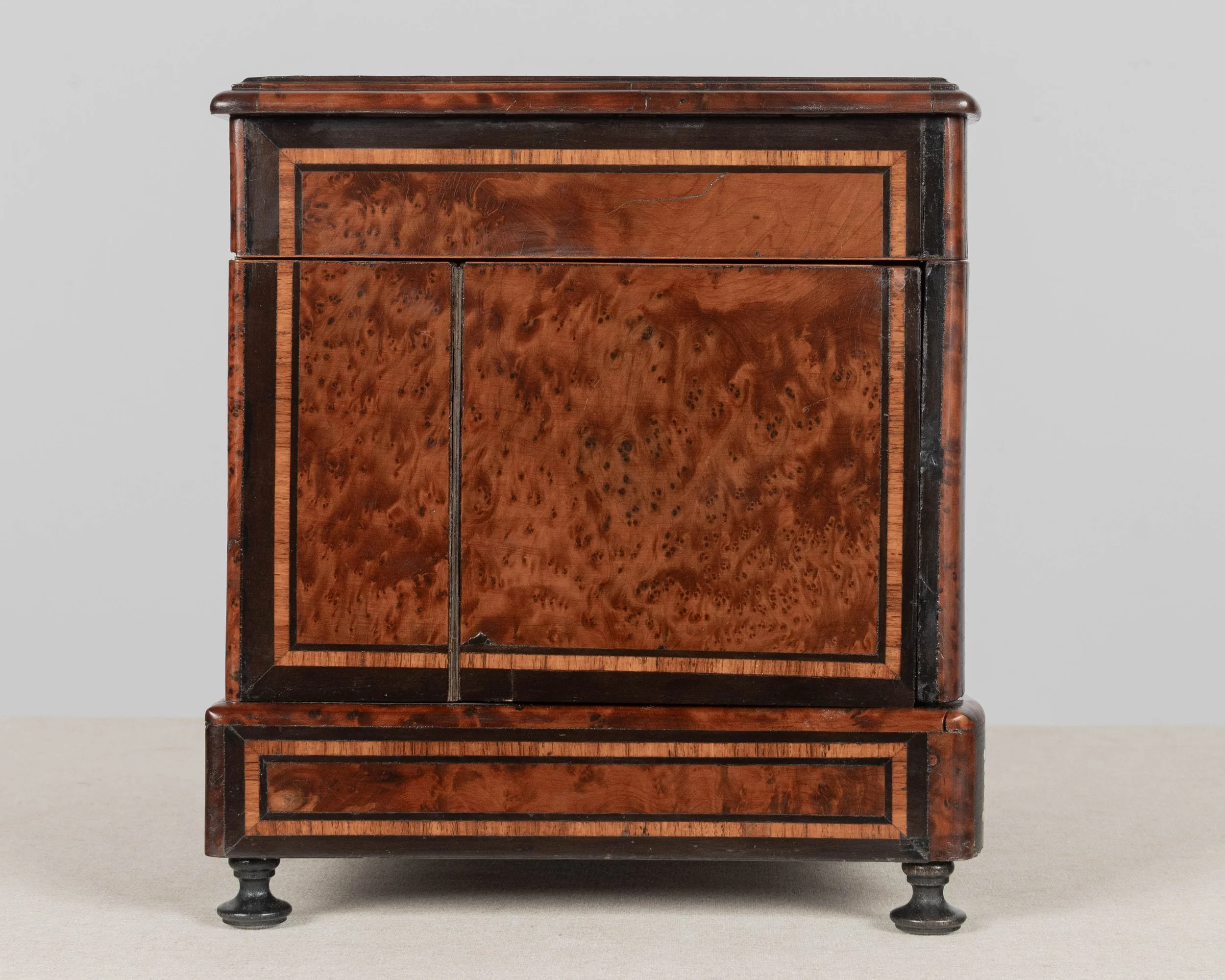 A fine 19th century French Napoleon III tantalus, or cave à liqueur, in the style of Charles-Guillaume Diehl