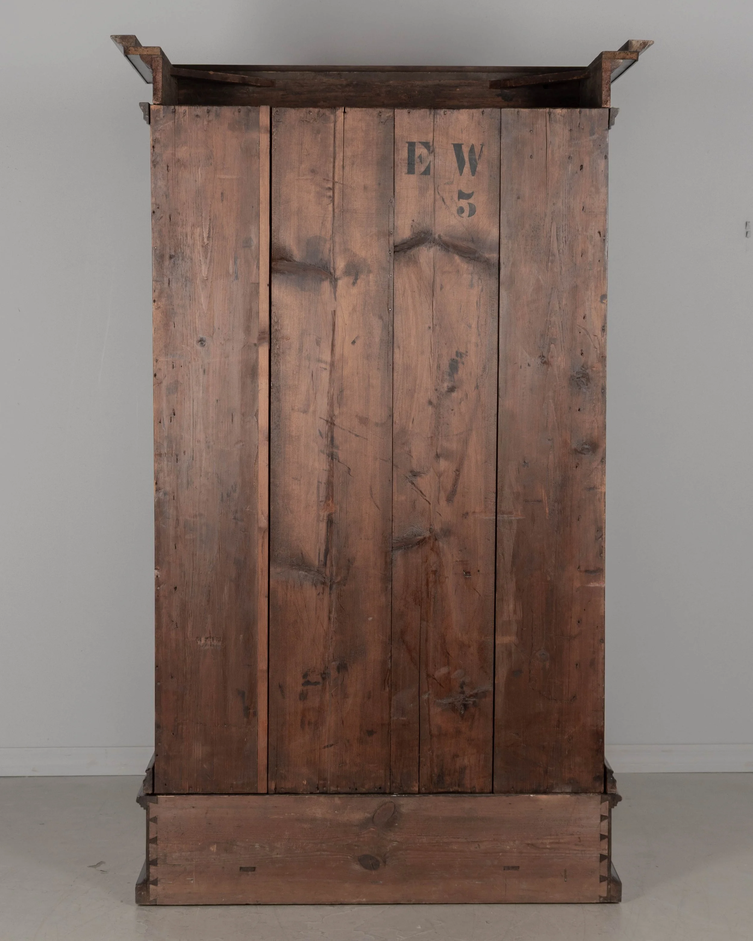 19th Century French Perigord Armoire made of solid walnut and veneers of walnut with pine as a secondary wood.