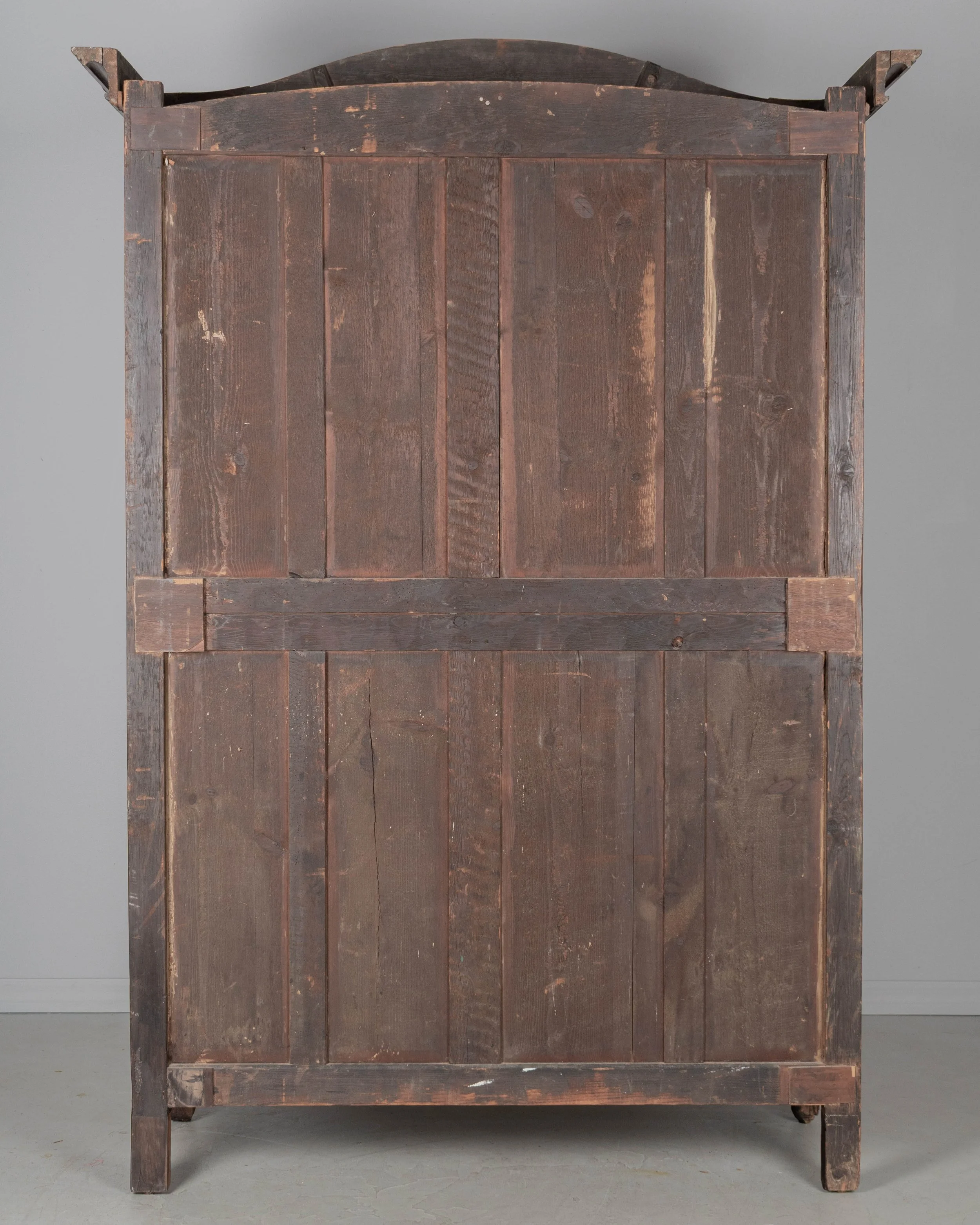 An early 19th century Louis XV country French bridal armoire from Normandy.