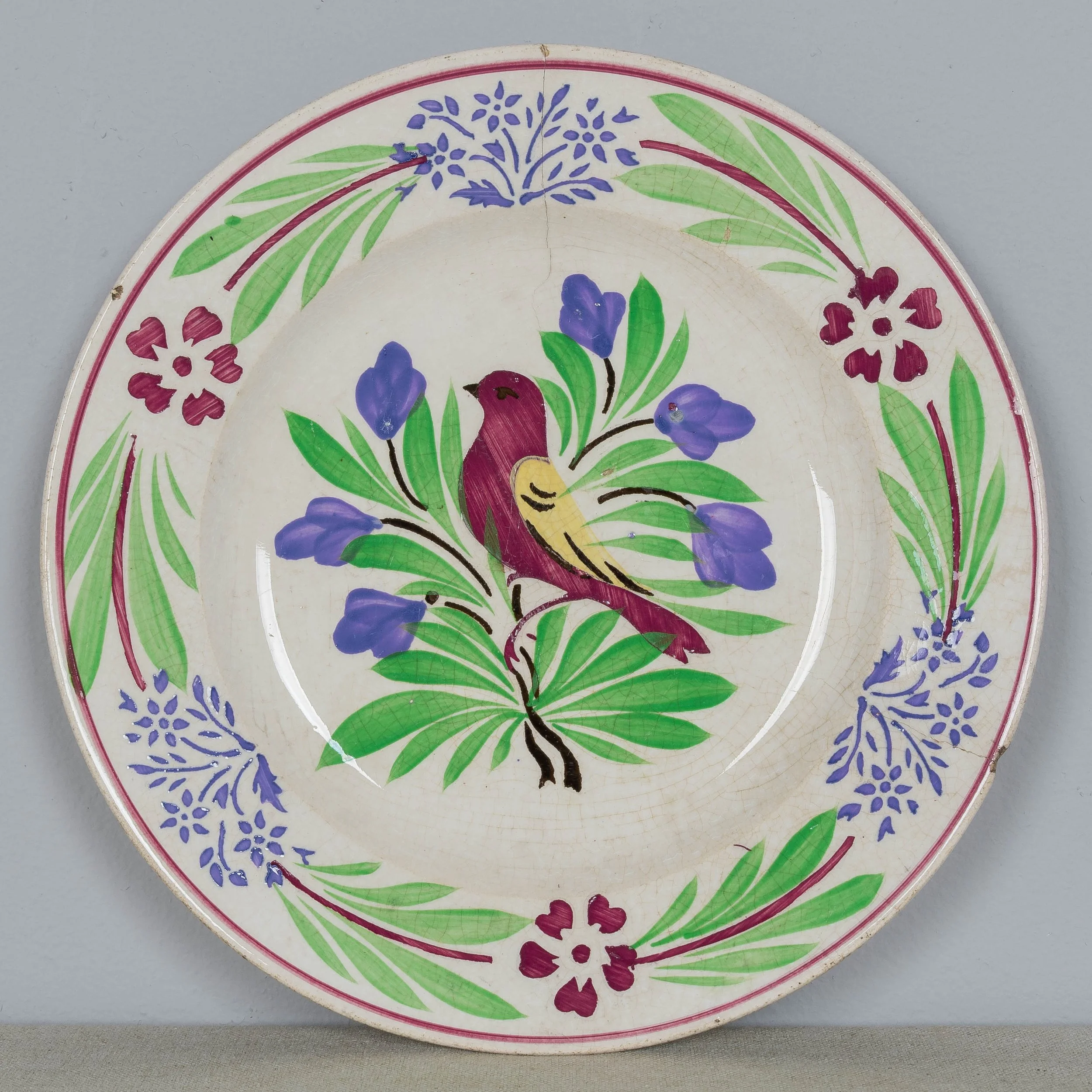 A set of three 19th Century French glazed faience plates made by Sarreguemines