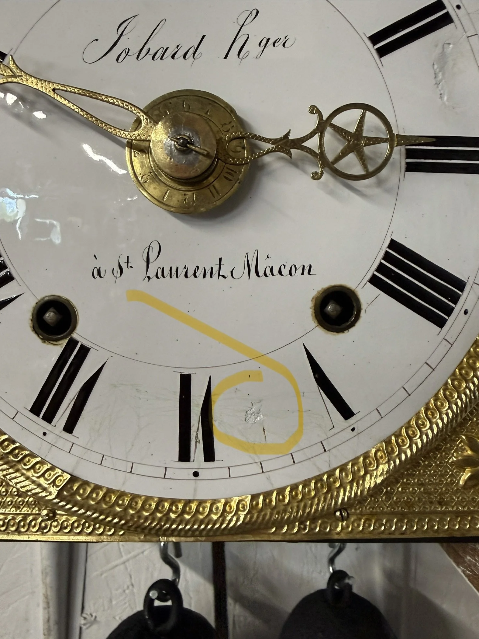 A late 19th century Morbier works for a tall case clock from Jobert Horloger at St Laurent Mâcon with brass embossment of Sun King
