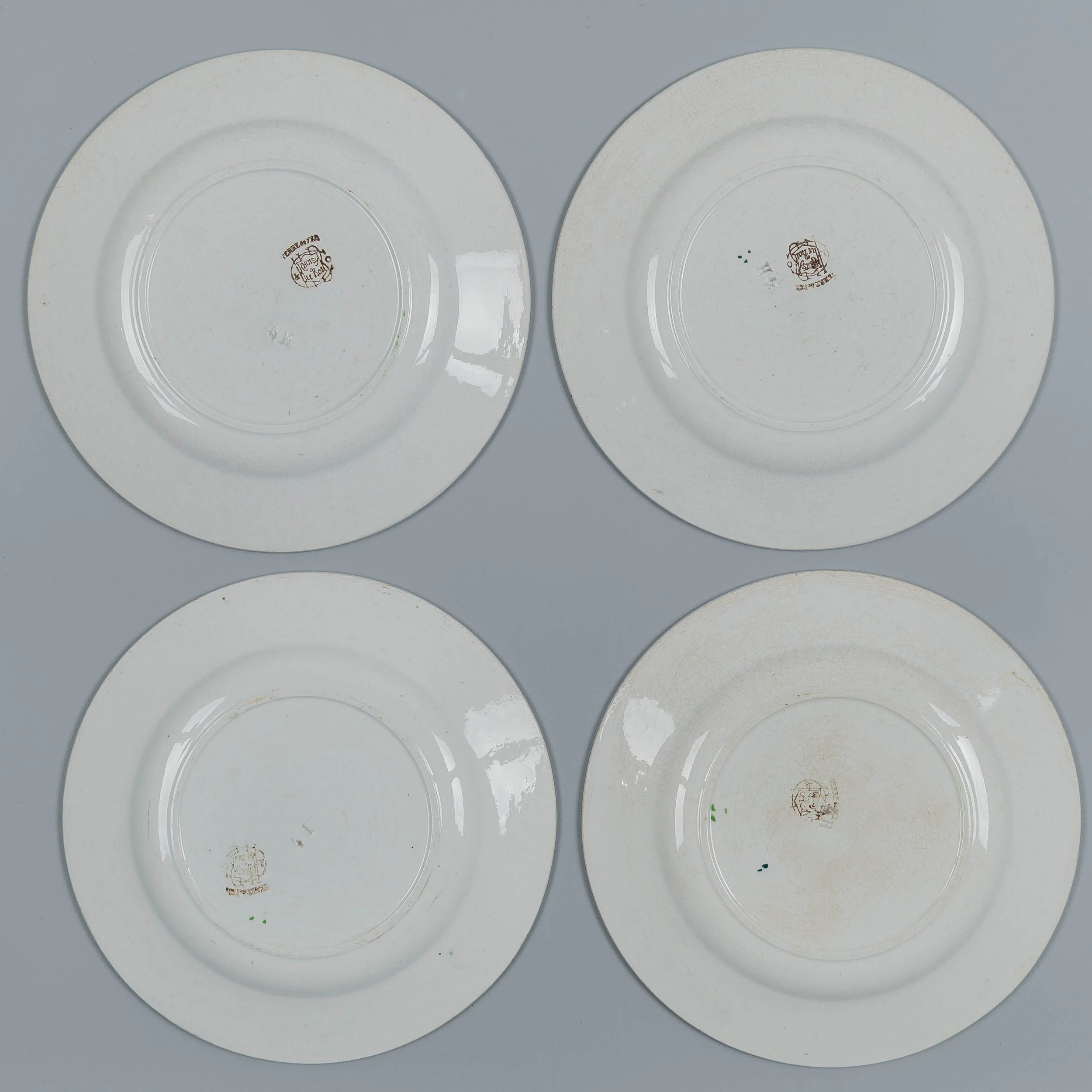 A set of four  19th Century French glazed earthenware plate by H. B. Boulanger Choisy-le-Roi