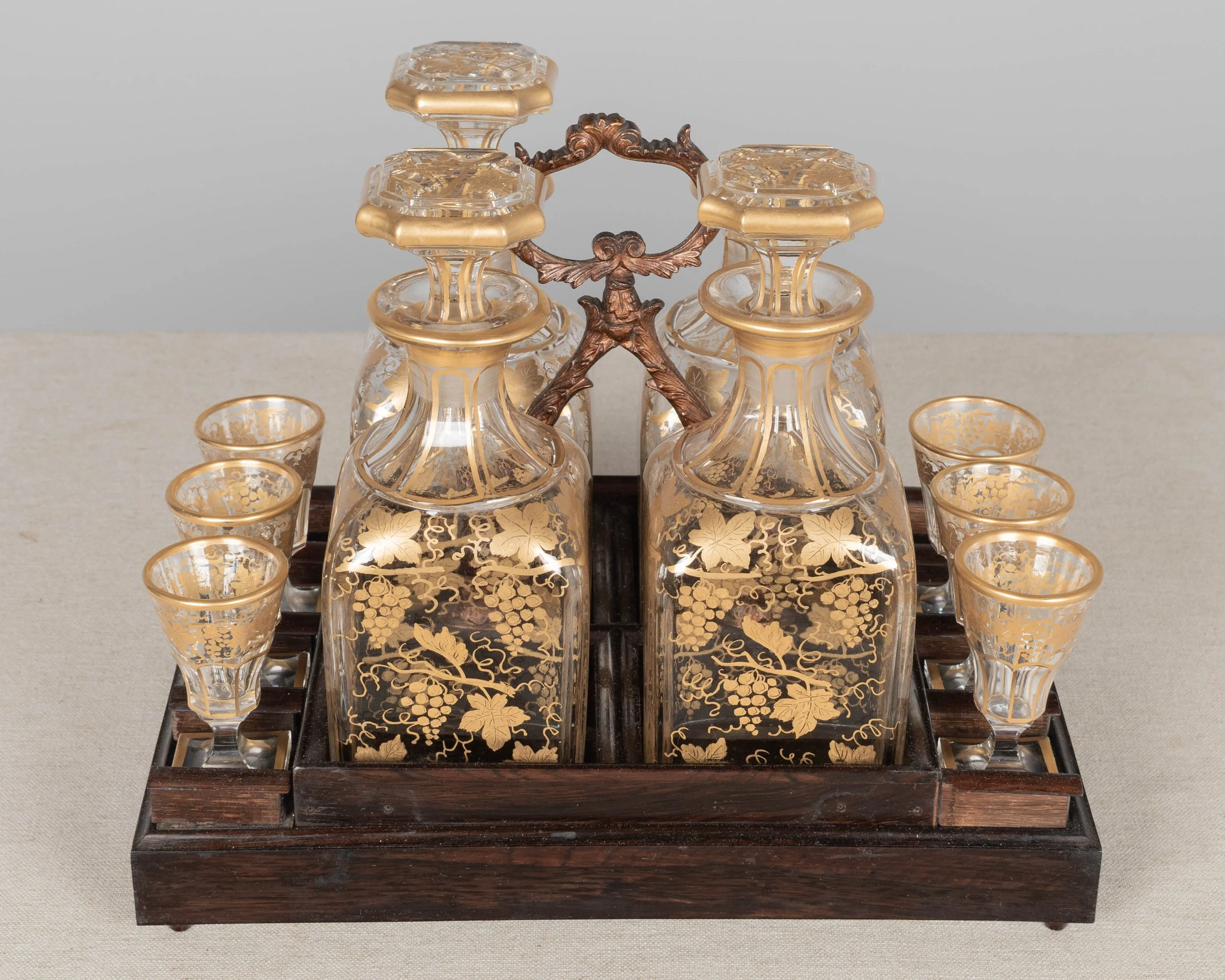 A fine 19th century French Napoleon III tantalus, or cave à liqueur, in the style of Charles-Guillaume Diehl