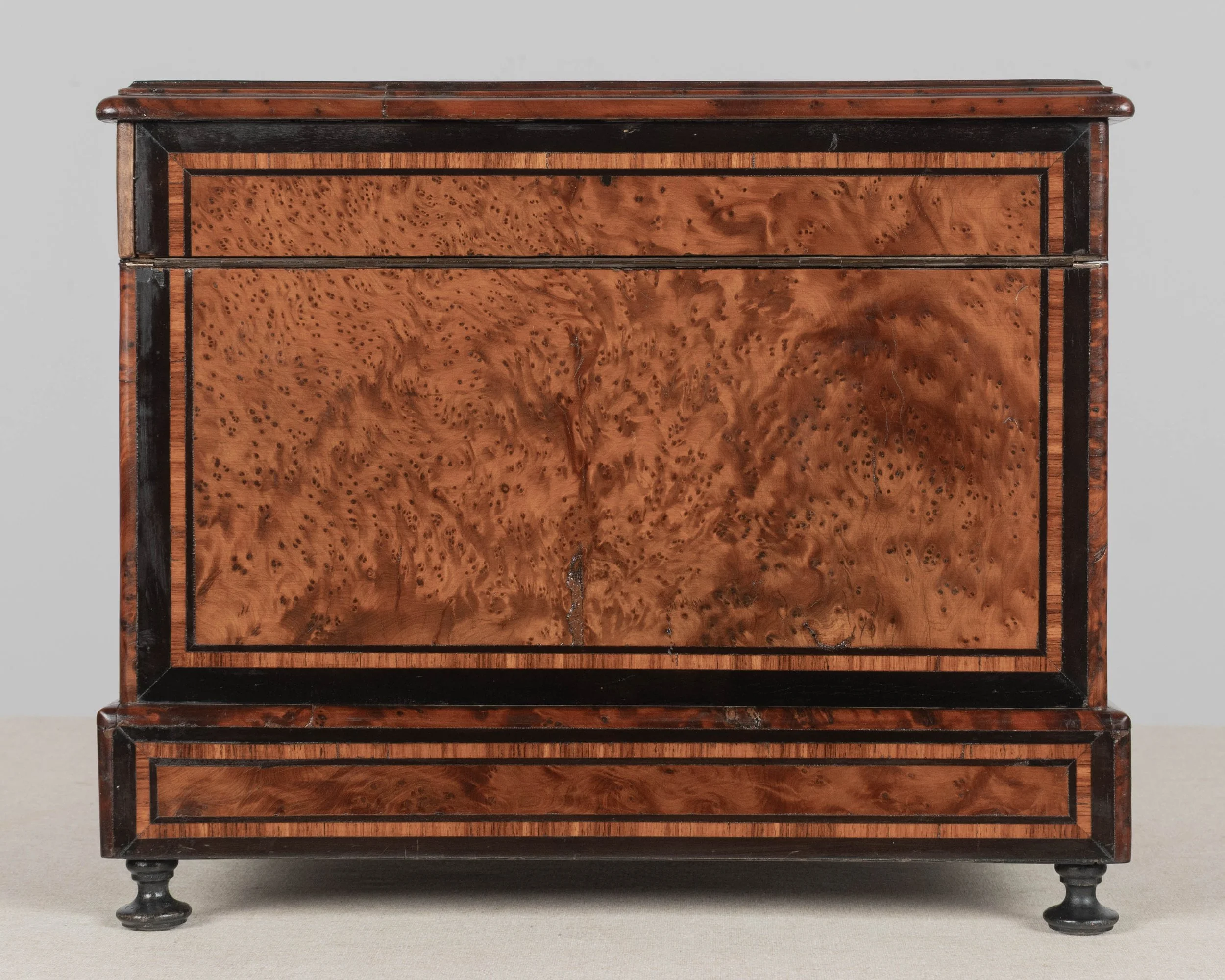 A fine 19th century French Napoleon III tantalus, or cave à liqueur, in the style of Charles-Guillaume Diehl