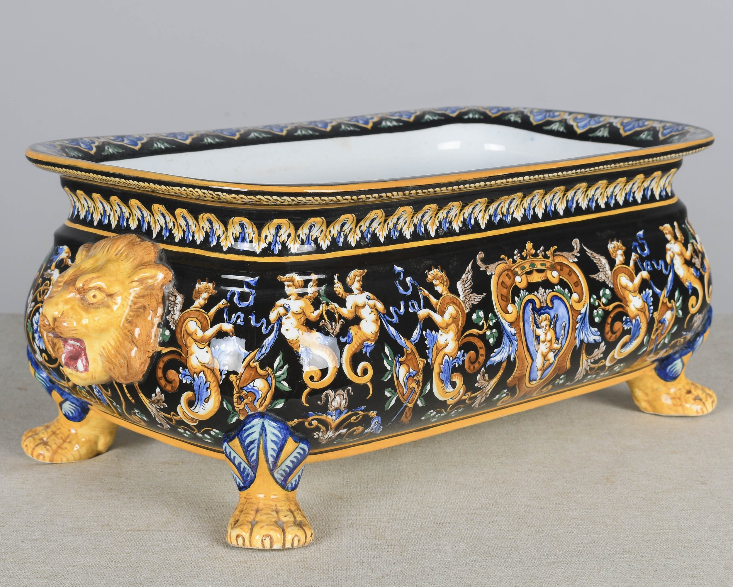 A late 19th century French Gien faience ceramic jardinière, or shallow footed centerpiece bowl.